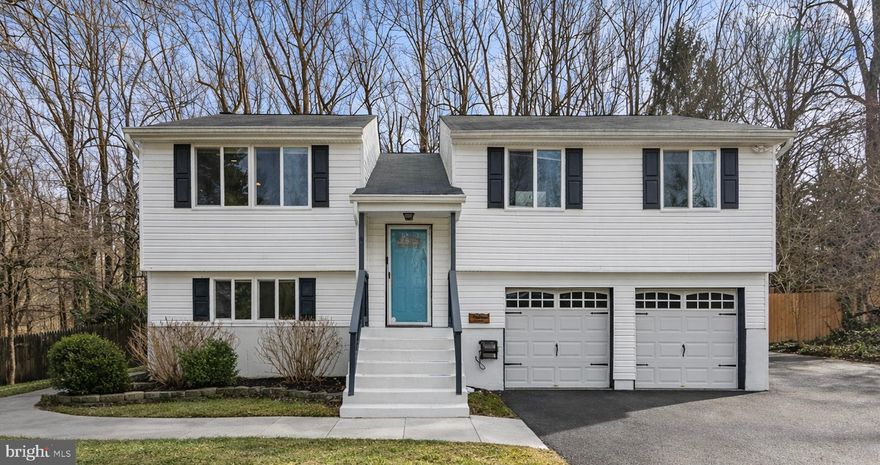 Welcome to this this move-in ready home! Located in a water-access community with NO HOA fees, just a short walk to the private community beach. This modern home offers hardwood and tile flooring throughout most of the main level, cathedral ceilings, and a bright open layout. The updated kitchen features beautiful upgraded countertops, stainless steel appliances, and a tumbled travertine backsplash. The home offers 3 bedrooms, 3 full baths, including an owners ensuite, a finished basement, and a bonus room with a separate entrance—ideal for a home office.  Enjoy outdoor living with a flat and privacy-fenced backyard, deck, and ample parking with a paved driveway and 2 car garage. The recently added retaining walls in the front yard make yard maintenance a breeze. Conveniently located minutes from Prince Frederick shopping, dining, schools, and more. Don’t miss this water-access home with no HOA. This home is expected to be active on the market in mid-April.