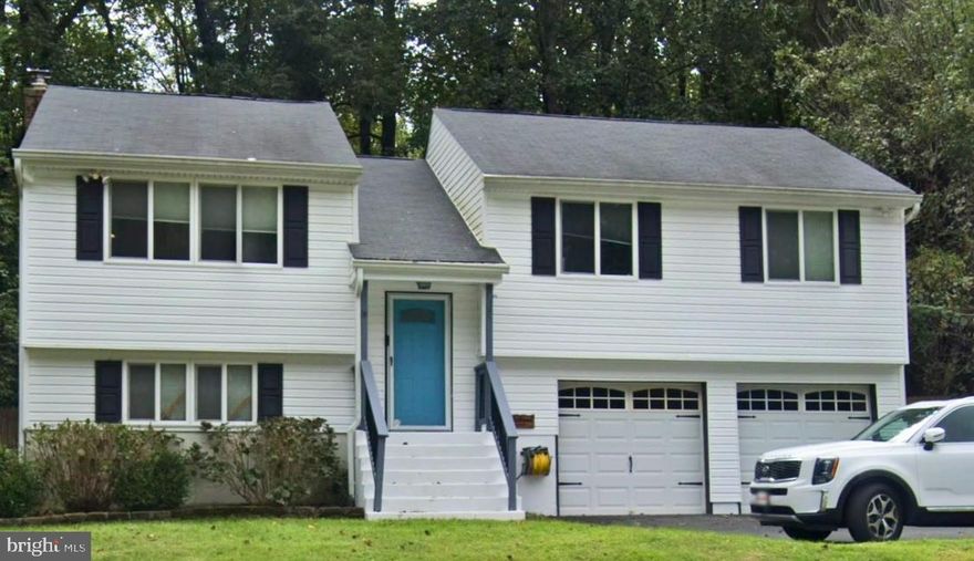 Welcome to this this move-in ready home! Located in a water-access community with NO HOA fees, just a short walk to the private community beach. This modern home offers hardwood and tile flooring throughout most of the main level, cathedral ceilings, and a bright open layout. The updated kitchen features beautiful upgraded countertops, stainless steel appliances, and a tumbled travertine backsplash. The home offers 3 bedrooms, 3 full baths, including an owners ensuite, a finished basement, and a bonus room with a separate entrance—ideal for a home office.  Enjoy outdoor living with a flat and privacy-fenced backyard, deck, and ample parking with a paved driveway and 2 car garage. The recently added retaining walls in the front yard make yard maintenance a breeze. Conveniently located minutes from Prince Frederick shopping, dining, schools, and more. Don’t miss this water-access home with no HOA. This home is expected to be active on the market in mid-March.