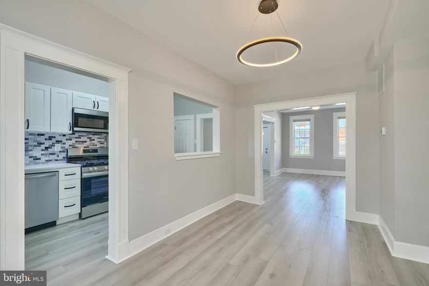 *Ask LA about Special Seller Concessions* Beautifully Renovated Home, so Elegant ! Gorgeous Kitchen with Stainless Appliances, Granite Countertop, and Wood Shaker Cabinets. Upstairs Bathroom features Custom Tilework, Designer Fixtures, and Designer Lighting. Large Master Bedroom. Fully Finished Basement Suite includes a Family Room, plus Bedroom and Full Bathroom with Custom Tilework and Designer Fixtures. Plus a Bonus Storage Room. Luxury Vinyl Flooring, New Carpet, Fenced Front & Back Yards, Parking Pad, Deck plus 2 porches, Central Heat & AC, Cool Modern Lighting. You will Love this Home!  Also see our other listing on  this block, 4004 Fairfax