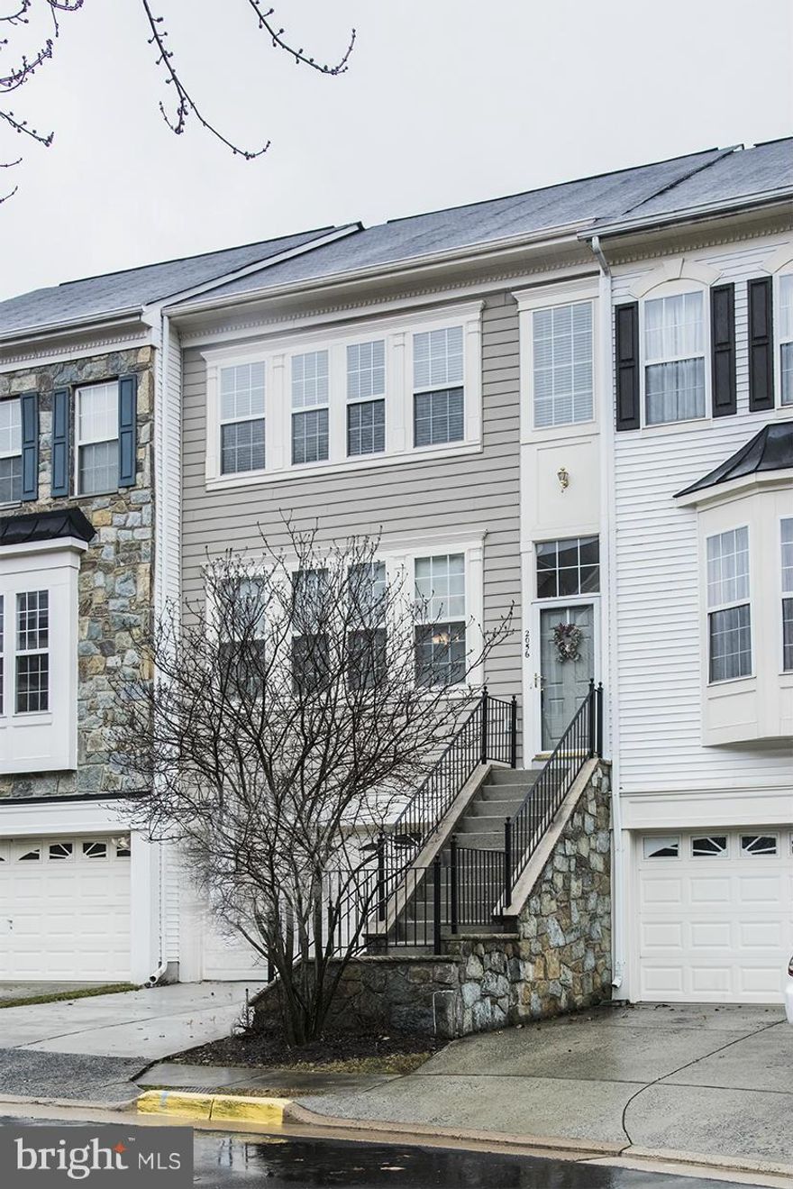 Stunning 3BR 2,fullBA, 2halfBA TH! Ideal location, 1/2 mile to future Metro station! New KIT granite & upgraded appliances. New durable laminate floor on main. Spacious extension on all 3 lvls. Upgraded NEST thermostat system. All BRs w/ vaulted ceiling. Lrg LL rec rm w/ gas FP. Wood deck backs to mature trees. Must see!