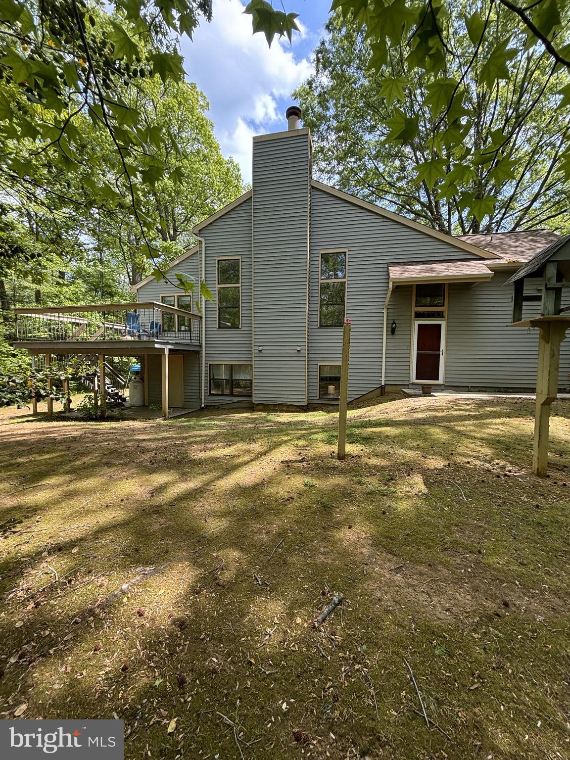 Estate sale being sold AS IS. Great location and lots of natural light. End unit with brand new roof. HOA fees only $135 per month. Interior needs updating and carpet removed, but this spacious end unit has lots of potential and great views to private woods in the rear. Two assigned parking spaces. Convenient location.
