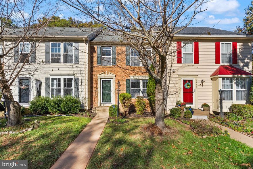 Don't miss this fantastic opportunity to live in the Cascades community. This 3-level townhouse has 2,048 square feet of thoughtfully designed living space. This home features new flooring throughout the upper level, and 2-year old carpet on the main and lower levels, the home is recently painted. The 3 spacious bedrooms have impressive vaulted ceilings. The heart of the home boasts upgraded quartz countertops, a generous island and storage pantry. The eat-in kitchen features table space, access to the deck, and adjacent family room bump out that can also double as a formal dining area. Retreat to the luxurious primary suite, featuring two walk-in closets and a spa-like bathroom equipped with a soaking tub and a walk-in shower, along with dual vanities. The finished basement features access to the rear yards and daylight windows with a versatile floor plan endless possibilities-whether it be a home gym, office with gas fireplace, or entertainment area. Enjoy the convenience of a dedicated laundry space and ample storage. Outside, the property backs onto common area wooded green space, providing a tranquil view and a sense of privacy. The deck is perfect for outdoor entertaining or simply enjoying a morning coffee while soaking in the peaceful surroundings. Residents of Cascades enjoy a wealth of amenities, including a community pool, fitness center, basketball courts, and scenic walking trails, fostering an active and vibrant lifestyle. With two assigned parking spaces and plenty of open visitor spaces, entertaining is a breeze. Experience the perfect blend of luxury, comfort, and community in this stunning townhouse, where every detail has been curated for your enjoyment.