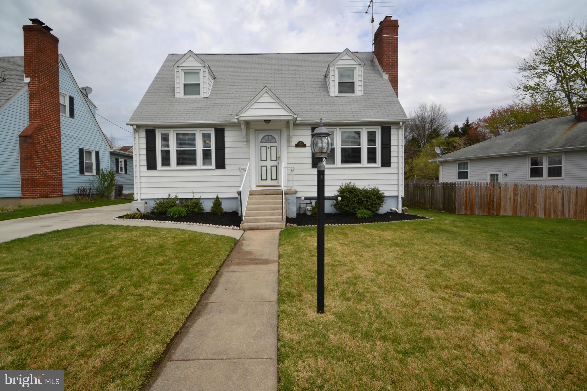 Beautiful 3bd cape cod w/large fenced yard, patio & XL shed, driveway 4 years old. Main level w/wood floors, lg bedroom, living room w/ wood burning fireplace, large dining room, replacement windows,updated kitchen w/door leading to porch and yard, Upper level w 2 large bedrooms and full ba. LL offers spacious family room perfect for entertaining, laundry and storage w walkout