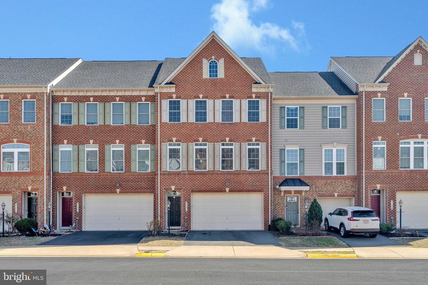 This luxurious 3-bedroom, 4-bathroom townhome in Ashburn, featuring 10-foot bump-outs and over 3,200 square feet of finished living space across 3 levels, offers the perfect blend of low-maintenance living and high-end comfort. The spacious, sun-drenched interior boasts upgraded LVP floors on the main level and a cozy linear gas fireplace, setting a modern and welcoming tone throughout the home. 
The gourmet kitchen is a chef’s dream, complete with stainless steel appliances, granite countertops, a walk-in pantry, built-in microwave/wall oven combo, and a commercial-grade range hood that vents outside—ideal for cooking and entertaining guests.
The expansive main bedroom suite is a true sanctuary, featuring two walk-in closets and a spacious, spa-like bathroom designed for ultimate relaxation. On the upper level, two additional spacious bedrooms, each with generous closet space, share a full bathroom, and a conveniently located laundry room adds ease to daily chores.
The fully finished basement offers even more living space, with a recreation area, a fourth bath, and room for a fourth bedroom—perfect for guests or hobbies. Outside, enjoy a low-maintenance Trex composite deck overlooking a fully fenced backyard with a brick paver patio—ideal for outdoor dining or unwinding.
Additional features include an inviting foyer, a generously sized 2-car garage, ample parking, and a meticulously maintained interior. The home is ideally located just steps from the WO & D paved Trail and Hampshire Park, providing outdoor enthusiasts with plenty of recreational opportunities.
This prime location also offers proximity to top-rated schools, a nearby Tot Lot and Gazebo, and convenient access to Rt. 7, the Silver Line Metro, Dulles Airport, and major shopping centers such as One Loudoun and Dulles Town Center.
Don’t miss the opportunity to make this exceptional home yours—schedule your showing today!