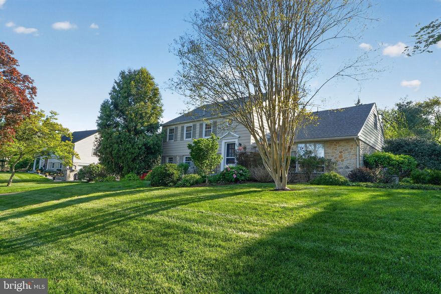 Set on a spectacular, beautifully landscaped lot, this exceptional single-family home showcases timeless curb appeal with its elegant blend of stone, brick and siding.  Designed as a spacious five-level split, this home offers remarkable versatility, generous living space and thoughtful updates throughout.  Enter the main level at the front door from the Flagstone walkway to a welcoming entry foyer that opens to a large, step down Living Room filled with natural light, along with a formal Dining Room ideal for entertaining.  The modern kitchen is equipped with a Sub-Zero refrigerator, newer Dacor double wall hung ovens, gas countertop range, Corian countertop and plenty of recessed lighting all overlooking the rear pergola and grounds.  Both the kitchen and dining room offer direct access to a comfortable screened in porch with two ceiling fans- an ideal setting for relaxing or hosting guests while enjoying the surroundings.  The lower level welcomes you with a bright and inviting Family Room centered around a magnificent wood burning stone fireplace, built in entertainment center and sliding glass door to a rear concrete pation.  This level also includes a convenient laundry room with door to driveway, powder room and direct access to the two-car garage.  Upstairs, the bedroom levels provide exceptional space and flexibility.  One level offers a huge primary suite complete with an updated ceramic tile bahroom and large closet space, along with two additional bedrooms and an updated ceramic tile hall bathroom.  The upper level features two more bedrooms, a third full bathroom and access to an expansive, unfinished attic for potential additional living space!  The home also includes and basement and crawl space for storage options.  The property features numerous improvements including newer roof, replacement windows, appliances, hot water heater, alarm system, hardwood flooring, backup generator, and much, much more.  The grounds are truly a standout feature, with lush, mature landscaping, vibrant plantings and carefully designed outdoor spaces that creat a park like setting for both quiet enjoyment and entertaining.  Ideally located within walking distance to the Wallingford Train Station and downtown Media, and just minutes from major thoroughfares, this home location offers easy access to Philadelphia, Wilmington and the airport.  A rare opportunity to own a beautifully maintained home wiht exceptional space, imporvements and unbeatable location!