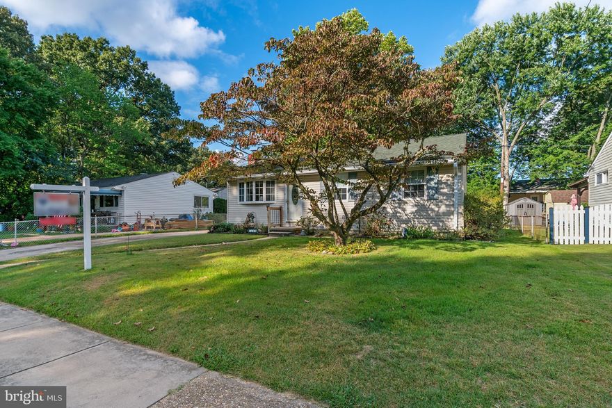 1402 Rowe Drive offers comfort, convenience, and character. This move-in ready three-bedroom, two-bath home sits on a quiet dead-end street just steps from North Glen Park with walking trails, ball fields, and playgrounds. Inside, you will find original hardwood floors—currently under carpet in the living area and all three upstairs bedrooms—a full wall masonry fireplace, and a gas stove for those who love to cook. The full basement provides a fourth bedroom, abundant storage, and additional living space that could serve as a guest area, home office, or recreation room.  Major updates include a new hot water heater in 2024, newer AC unit along with a roof, siding, and windows replaced about 10 to 12 years ago, giving you peace of mind for years to come. Outside, relax or entertain on the covered rear patio overlooking a fenced yard with a storage shed, perfect for outdoor fun. Commuters will appreciate quick access to I-695, I-97, Route 2, and Route 10, making Baltimore, Annapolis, and Fort Meade an easy drive. Shopping, dining, and schools are also nearby. The sellers are providing a one-year home warranty for the new owner for added peace of mind.