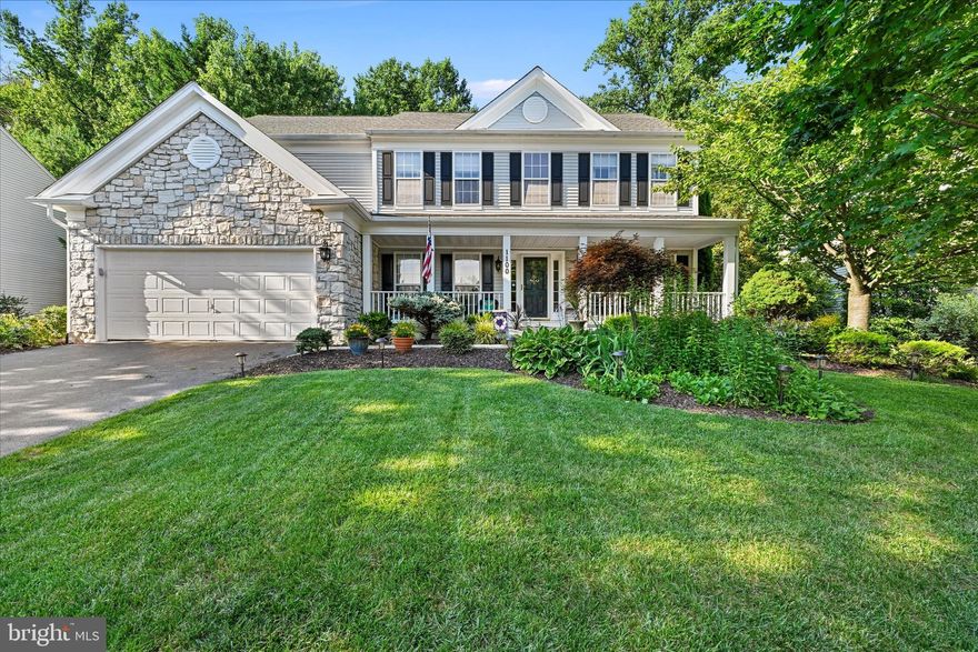 **Professional photos are in! Take a look!!** Beautiful 5 bed, 3.5 bath stone front colonial in the much sought after Vineyard Oak development. This home boasts over 4200 FINISHED square feet with a fully finished basement and potential in-law suite. This stunning 2 car garage, stone front home, is warm and welcoming with a large charming front porch. As you enter the home you'll enter a bright sunlit foyer straddled by a formal dining and living rooms, both with great character and charm, including 9 foot ceilings, crown molding, chair rails, warm paint colors. The open 2 story family room sits at the back of the home with a beautiful gas fireplace with marble surround and large windows. A half bath and den/office sits adjacent to the family room. As well, the family room connects to the large eat in kitchen that has 9 ft ceilings, space for a table and a large island w/ bar stools and slider to your stone paver patio and tree lined back yard with in ground sprinkler system (front and back). Granite counters, 42 inch cabinets and stainless steel appliances give a gourmet feel. A large pantry recently upgraded w/ custom shelving, granite counters and extra cabinets for storage. Off the kitchen is a mudroom/laundry room with garage access, new washer and dryer and cubbies and hooks for the kiddos' backpacks and goods. The kitchen lends access to the large finished basement where you'll find a workout room, a large rec/media room with large built ins, a large 5th bedroom and full bath and slider walk out with steps to your backyard. This area could be used as an in-law suite. The remaining bedrooms are on the upper level w/ a spacious and bright primary bedroom w/ a lovely tray ceiling, large walk in closet and primary bath w/ double vanity w/ granite counters, high tech exhaust fan (plays music), soaking tub, separate shower and water closet. The open hallway on the upper level overlooks the 2 story family room and leads to another full bath and 3 more large, bright bedrooms. This home has so much to offer.  You need to come see for yourself! Make your appointment to see today or join us for an Open House on Saturday, July 16th, from 10am to 1pm. Updates: Roof <3 yrs old; Basement carpet - just replaced this week; Pantry - custom redo; mudroom - shelving/cubbies; exhaust fans - high tech w/ music.   Welcome Home!!!!!!!!!!!