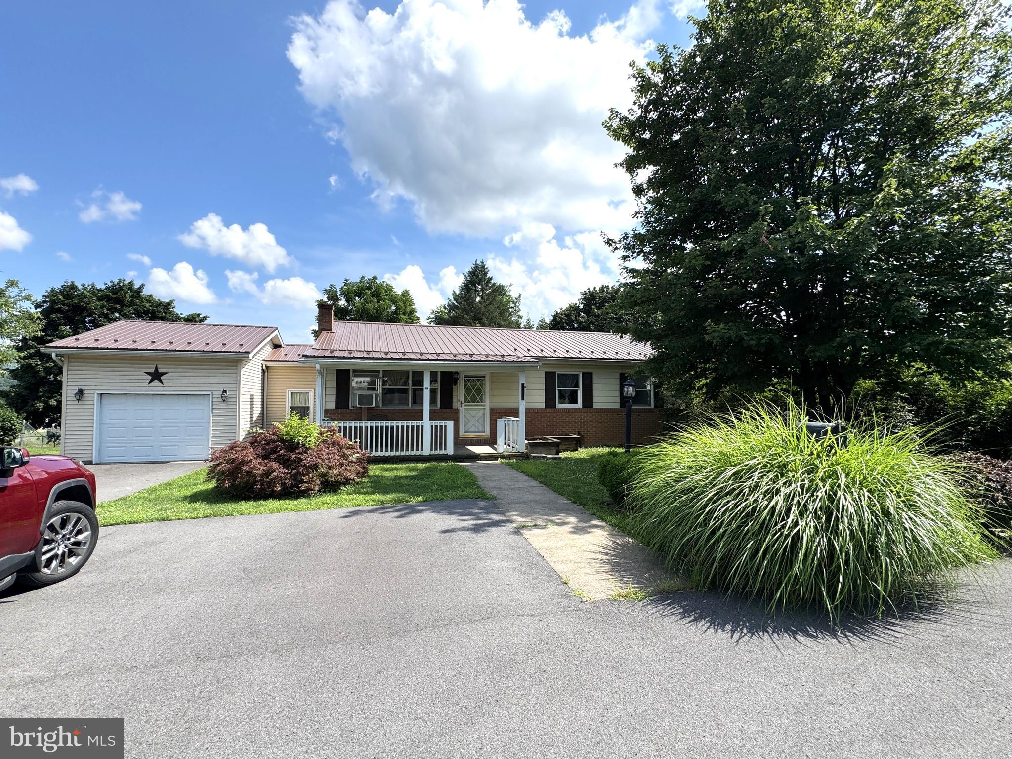 This home offers a ton of possibilities and space. Located in Pleasant Acres, this property is convenient to it all, walk to school, the games, the hospital, a stroll through the neighborhood. This home features on the main floor, open living room, updated kitchen with large pantry, 1st floor laundry, Full bathroom and 2 bedrooms with lots of closet space. The lower level has a huge picture window, walk out door to the side driveway, fully finished as an in-law suite, or utilize as a kids space for a play area, an apartment space, could even rent it out. It features a bedroom area with closets, kitchen, living room, 3/4 bathroom, laundry area, and a 2nd half bath. Endless opportunities with this one. Property also offers a rear covered & screened in porch, newer fenced in yard, a storage shed, the 1 car attached garage, & extra storage space next to the garage. Lets make this home yours!
