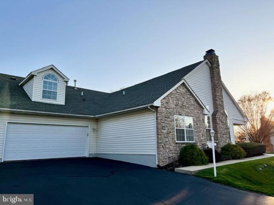 This meticulously maintained townhouse is pristine and move-in ready. Recently updated with fresh paint and brand-new carpeting throughout, this home is located in the highly sought-after 55+ community of Lionsgate. Residents enjoy a wealth of amenities, including a swimming pool, tennis/pickleball courts, a fitness center, and a clubhouse. Upon arrival, choose between entering through the front door or pulling your car into the oversized attached two-car garage, where you can access a private entry leading directly to the laundry room and kitchen. The kitchen boasts generous counter space and cabinetry, flowing effortlessly into the bright and inviting living area. The great room features vaulted ceilings, expansive windows, and a cozy gas fireplace. Glass sliders open to a private front patio, providing an ideal space for outdoor relaxation.  Glass French doors lead to a den perfect for a study/office or an additional living room.
The spacious primary bedroom offers a tranquil retreat with an en-suite bathroom including glass shower and a large walk-in closet. The second bedroom includes its own private bath with a tub-shower combo, ensuring comfort and convenience for guests. Upstairs, a versatile loft space awaits, perfect as a bedroom, home office, or crafting room.  The loft closet offers even more storage and the potential to be easily converted into a half bath.  The low maintenance exterior includes newer roof (2021) and gutter heaters. This home is ideal for anyone seeking an affordable, well-maintained residence in a vibrant active adult community.