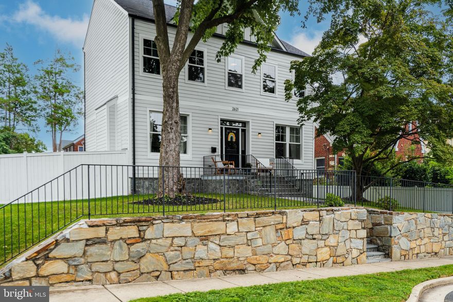 This gated-entry 5 BR / 4.5 BA luxury home walking distance to Nottingham ES and Yorktown HS is the quintessential North Arlington home. Interior feature upgrades include 9'+ high ceilings, designer lighting, wide plank French Oak floors on the main and upper levels, commercial-grade stainless appliances w/ wine fridge, and a dedicated mudroom with custom carpentry off of the attached garage entry. The main level offers an open layout to gather - living room (with built-in gas fireplace), dining room, powder room, breakfast area and a contemporary Chef's Kitchen featuring white quartz counters, large, central wet island with storage and seating for 7. Upstairs is the primary bedroom with tray ceiling, walk-in closet and an ensuite bathroom (with heated tile floor) with European stylings including a floating double vanity and commode + a seamless steam shower with dual shower heads. Down the hall is a laundry area + 3 additional generously-sized bedrooms (one w/ ensuite bathroom) + a dual-entry hall full bathroom. Attic access in the hallway for additional storage. The lower-level offers luxury vinyl plank flooring, a NTC 5th bedroom with closet and a 4th full bathroom that opens to the expansive rec room walking up to patio area where a number of upgrades have been incorporated into the exterior - Full 6' white privacy fencing including gated-entry, white wrapped contemporary plank siding, custom flagstone front patio + walkway, natural stone retaining wall, and a manicured level lawn / landscaping. No HOA.