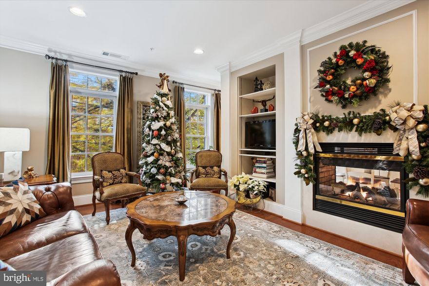 OPEN HOUSE CANCELLED   PROPERTY UNDER CONTRACT! Welcome to 540 Second St, Unit 204, a distinguished residence located in the prestigious Liberty Row community of Alexandria, VA. This luxurious property offers an exceptional living experience with its thoughtfully designed interiors and prime location.

Spanning 1,485 square feet, this elegant home features two spacious bedrooms and two and a half well-appointed bathrooms. The open-concept living area is graced with 9-foot ceilings and crown molding, enhancing the sense of space and sophistication. A double-sided fireplace serves as a focal point, providing warmth and ambiance to both the living and dining areas.

The gourmet kitchen is a chef's dream, equipped with high-end stainless steel appliances, granite countertops, and ample cabinetry. The spacious kitchen seamlessly flows into the elegant dining area, by way of the social breakfast bar,  making it perfect for both casual meals and formal entertaining.

One of the standout features of this property is the private balcony,  offering serene views of the beautiful courtyard, which in turn provides an element of privacy between buildings. This outdoor space is ideal for morning coffee or evening relaxation.

The master suite is a true retreat, featuring a spacious layout, walk-in closet, and a luxurious en-suite bathroom with dual-sink Quartz vanity, a soaking tub, and a frameless, glass-enclosed, walk-in shower. The second bedroom is equally inviting, with its own en-suite bathroom, ensuring comfort and privacy for guests, office space, a home gym, or all of the above!

Additional amenities include two dedicated garage parking spaces (F54 & F55), providing convenience and security. The Liberty Row community is known for its well-maintained grounds and upscale living environment.

Located in the heart of the vibrant North Old Town Alexandria, this property offers easy access to a variety of dining, shopping, and cultural attractions. The vibrant waterfront, historic sites, and charming streets of Old Town are just moments away, making this an ideal location for those seeking both luxury and convenience.  Location highlights include: less than 1 mile to Braddock Metro, less than 1 mile to the thriving King Street, less than 4 miles to Regan National Airport, less than 1 block to the recreation trail, approx 5 blocks to the waterfront, and within blocks of numerous restaurants, pubs, coffee shops, and stores.