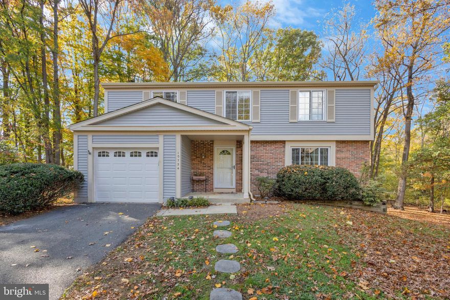 Welcome to your dream home! This beautifully updated Colonial is nestled on a private, almost half-acre lot that backs onto lush parkland, offering the perfect blend of tranquility and convenience. Located in a highly desirable area, this home is a true gem.

As you approach, you'll immediately appreciate the curb appeal of this meticulously maintained property. The exterior features brick and  vinyl siding and dual-pane windows, ensuring energy efficiency and a modern look. Step inside, and you'll find a home that has been lovingly cared for and thoughtfully updated.

The main level boasts a well-designed floor plan that includes a spacious living room and a separate dining room, perfect for hosting gatherings and special occasions. The heart of the home is the expansive kitchen, complete with top-of-the-line cabinets, elegant granite countertops, an island, and a convenient breakfast bar. The kitchen opens seamlessly to a cozy family room adorned with a beautiful brick fireplace, making it the ideal space for relaxation and entertainment.

Upstairs, you'll find four generously sized bedrooms and two bathrooms. The updated master bathroom is a true retreat, offering a large walk-in closet and private bath. Fresh paint and plush new carpets throughout the upper level add to the home's appeal.

The basement has been tastefully finished and serves as a fantastic entertainment area. Sliding doors lead to the backyard, creating a seamless indoor-outdoor flow. There's plenty of space for storage, and if desired, you can easily add a full bathroom to this level.

Outside, the large deck beckons for cookouts and family gatherings. Surrounded by the lush greenery of your own private oasis, you'll enjoy the peace and serenity that this oversized lot backing onto parkland provides.

This home is not only aesthetically pleasing but also practical with a great floor plan and high-end finishes throughout. It's evident that no detail has been overlooked in the care and maintenance of this property.

Additionally, the location couldn't be more convenient. You'll be just a short distance from a community pool and playground, making it easy to stay active and engaged with your neighbors. Plus, you'll have the added benefit of residing in a top-rated school district, ensuring great educational opportunities for your family.

This stunning Colonial offers the best of both worlds: a private and tranquil retreat on an expansive lot, coupled with the convenience of a prime location. Don't miss the opportunity to make this house your HOME! Schedule a showing today and experience the magic for yourself.