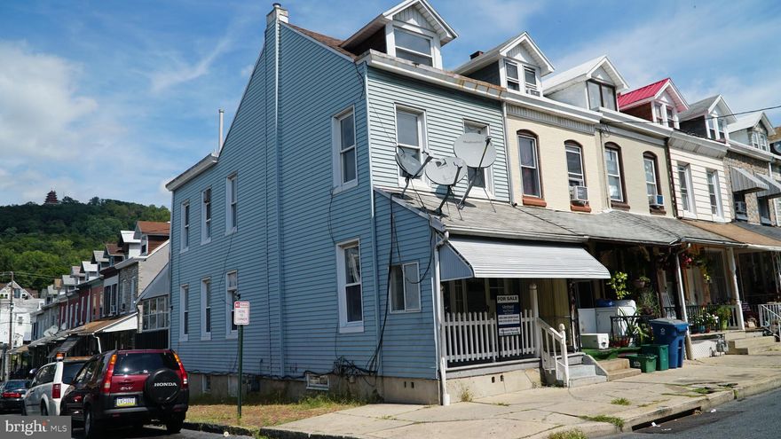 This corner property has recently been painted all throughout. The roof is less than 1 year old (except the back porch roof).  The kitchen floor has new ceramic tiles. The boiler and water heater are less than 5 years old. Electrical circuit panel is new and updated. All water line upgraded from galvanize to copper pipes. The drain (waste pipe has also been upgraded to PVC. It also comes with an enclosed rear porch which is great for summer barbecues, and other outdoor activities.
