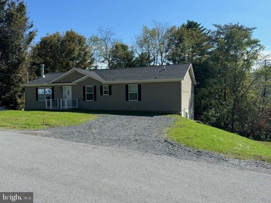 This beautiful MODEL (never lived in) Modular Ranch style home is conveniently located in the sought after Confer Development, as well as being in the Bald Eagle School District.  Enjoy the spacious living room where you can sit and relax while watching the glow from your stone fireplace.  You'll appreciate the open floor plan and the attractive  hickory cabinets and useful large center island in the kitchen.  Entertaining is a breeze with your easy to maintain deck. There is a flex place that would be perfect for a home office. The sizeable primary suite is sure to please. The private bath has dual sinks, and a roomy walk-in closet.  You'll be impressed to find that all three bedrooms have their own personal bathroom. Put your own touch in the full unfinished basement. The address of the property is Bellefonte, but this property is in a secluded spot in the MILESBURG area. Schedule your showing today!