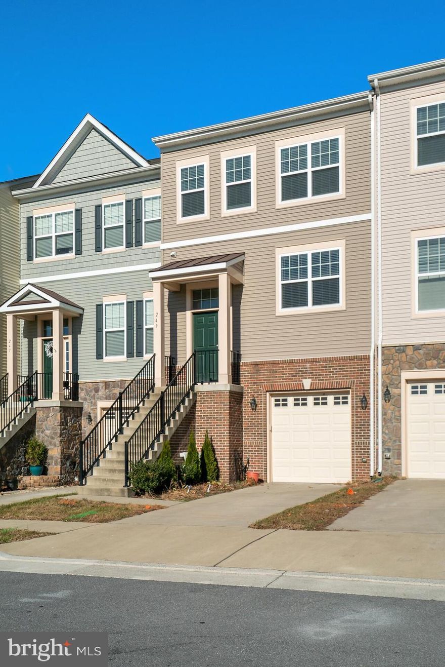 Beautifully maintained and spacious luxury townhome. This home is bright and airy with 9 foot ceilings on main level. The kitchen offers stainless steel appliances. The main level has an open concept with wood floors.  Kitchen with granite countertops, dining room and a large living area that opens to a nice deck for grilling and relaxing.  Beautiful scenic view from the deck.   As you ascend to the upper level you will find a lovely master suite with large walk-in closet and spacious master bath with tiled walk in glass shower as well as another full bath and 2 more bedrooms. The laundry is located conveniently on the bedroom level. On the lower level you will enjoy a finished family room and a full bath. The large window and patio door offers plenty of light. The back yard boasts large open space to grow fresh vegetable in the summer and relaxing view.  Extra amenities: blinds in all bedrooms and living room. Beautiful historic downtown Winchester within a few minutes. This house is located just miles from I-81, Route 7 and both the local High School and Elementary School. Perfect for commuters or those looking for a safe neighborhood for their children. This subdivision includes amenities such as basketball courts, pickle ball courts, a pavilion, a playground, lake access nearby and un-restricted guest parking.  Listing Agent is Related to Seller.