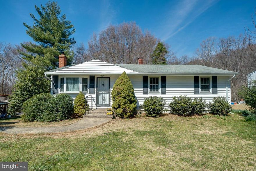 Affordable price and qualifies for USDA 100% financing! Owner replaced the furnace in 2015, water heater in 2014, AC in 2016. Energy efficient windows,vinyl siding,original hardwood floors under the carpeting. Large fenced backyard with deck and patio. Huge walk out basement has a wood stove, wet bar, bonus room and storage area.  Great location, close to shopping and public transportation!