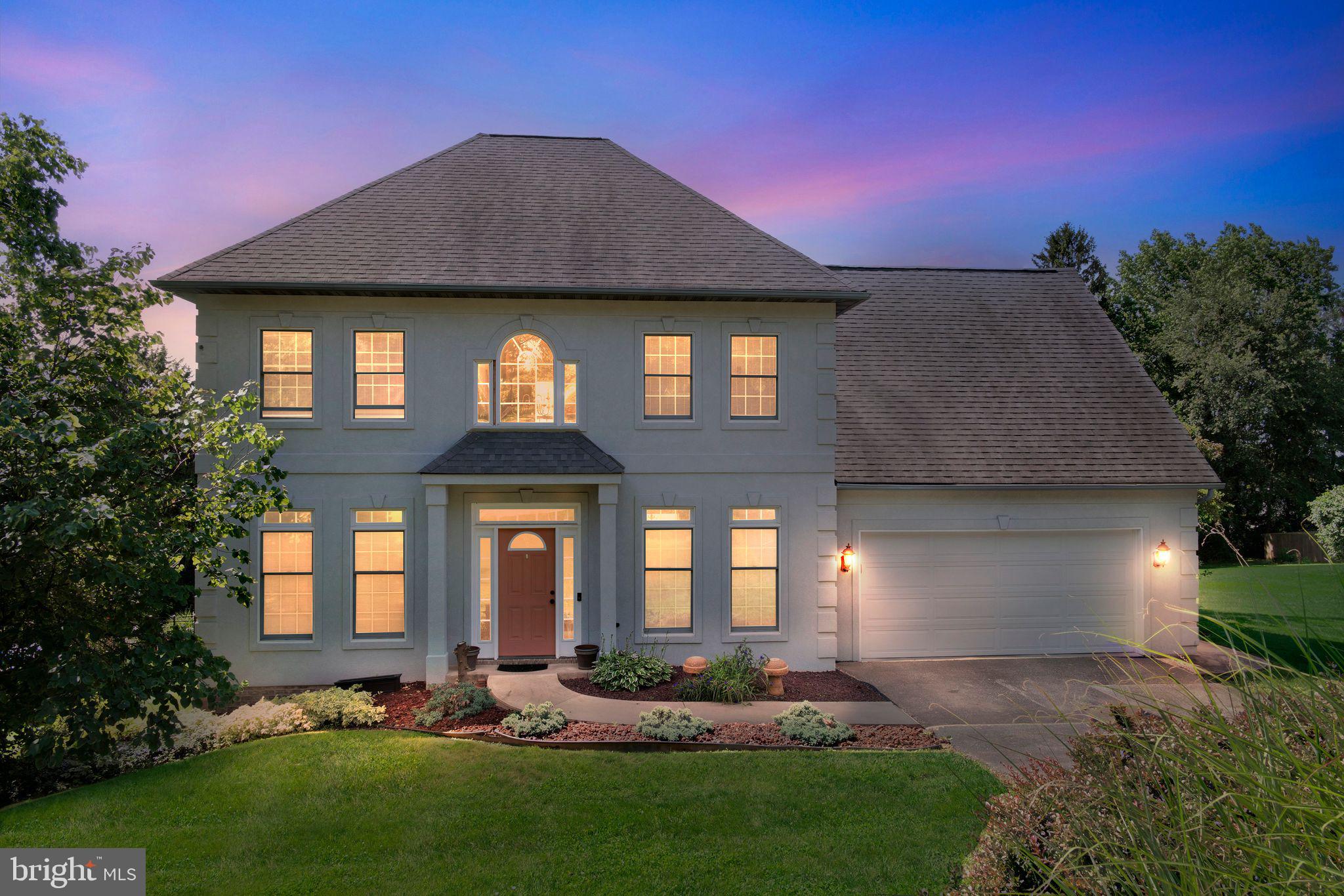 Welcome home to this spacious 4-bedroom, 2.5-bath residence offering 3,450 sq ft of beautifully designed living space. A dramatic two-story foyer with cathedral ceiling sets the tone for the warmth and elegance found throughout. The inviting living room features a cozy fireplace, ideal for relaxing or entertaining, while the formal dining room adds a touch of sophistication. Enjoy a sun-filled open kitchen that flows seamlessly to a large deck with stunning views. A main-level office or den with built-in shelves provides the perfect work-from-home setup. The first-floor laundry adds everyday convenience. Upstairs, the expansive primary suite features a tray ceiling, walk-in closet, and a luxurious bath with vaulted ceiling, whirlpool tub, and separate shower. The finished walk-out lower level includes a family room and access to a private patio. Complete with a 2-car attached garage, this home offers comfort, space, and thoughtful details at every turn.