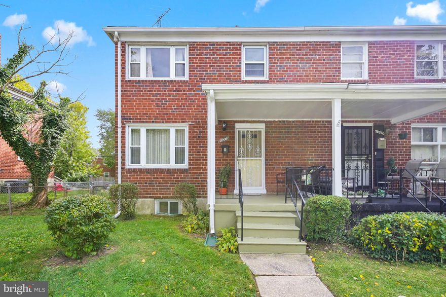 **Back on the market  **  Buyer financing fell thru***This end unit townhouse home  with open floor plan on first floor , features hardwood floors on main level and stairs . Bathroom has spa shower features .  Large Backyard space has a brick side patio and plenty of backyard space for the kids, pets or gardening . Plenty of storage on lower level , along with a large  finished room waiting for your imagination . This property conveys with a 2/car parking pad in back of home. Conveniently located near commuter routes , shopping, dining ,Belvedere Square , Morgan State and Johns Hopkins Universities . 1 Year AHS HOME WARRANTY OFFERED !