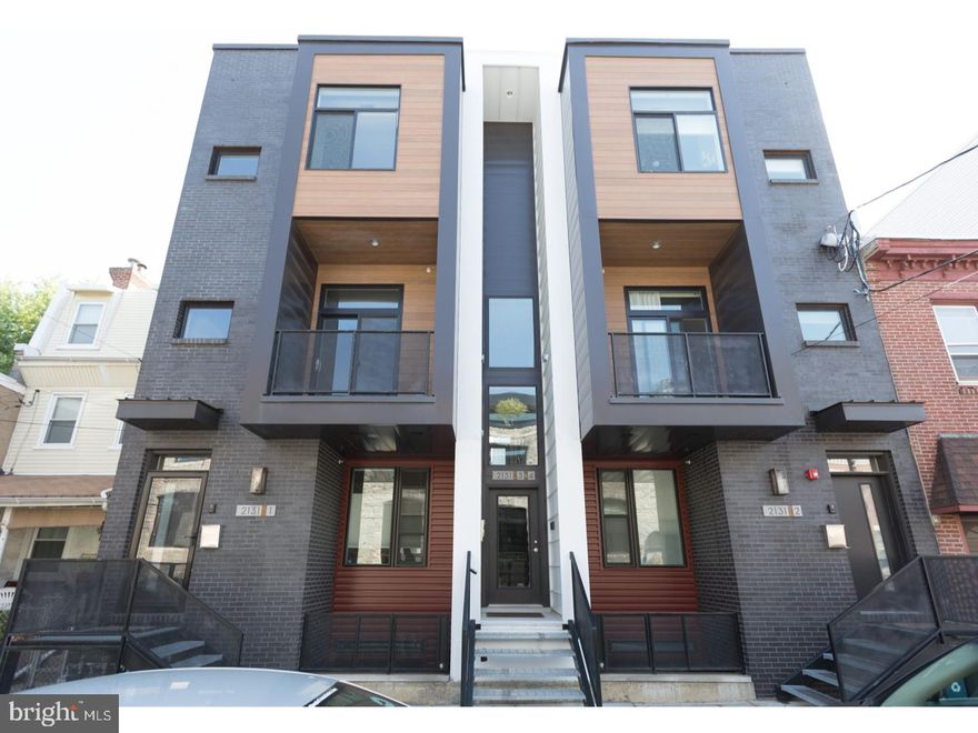 Welcome to 2131 E Firth St Unit #3, an amazing bi-level condo with private roof deck located in the prime section of Fishtown / East Kensington. This unit is just two years young and has 8 years remaining on the tax abatement. 2 bedrooms and 2.5 baths along with tons of high end finishes which includes ice white quartz counter tops, light gray maple cabinets, and glass tile back splash for the kitchen. Bathroom features include porcelain floor tile, white shaker maple cabinets, porcelain wall tile and glass tile. Stainless steel appliances included: 5 burner gas stove along with front load washer and dryer. The first floor is expansive open space with a modern feel. Tons of light. Strand bamboo flooring throughout. Half bath on the first floor. Upper lever has 2 very spacious bedrooms with ample closet space and washer/dryer.  Other features include tank-less hot water heater, split zone HVAC, intercom with video, and ceiling fans in bedrooms and living rooms. This is a MUST see. Available immediately. Block is very private and quaint which makes parking nearby a breeze. Magnificent construction surrounding this property. We welcome your visit today!