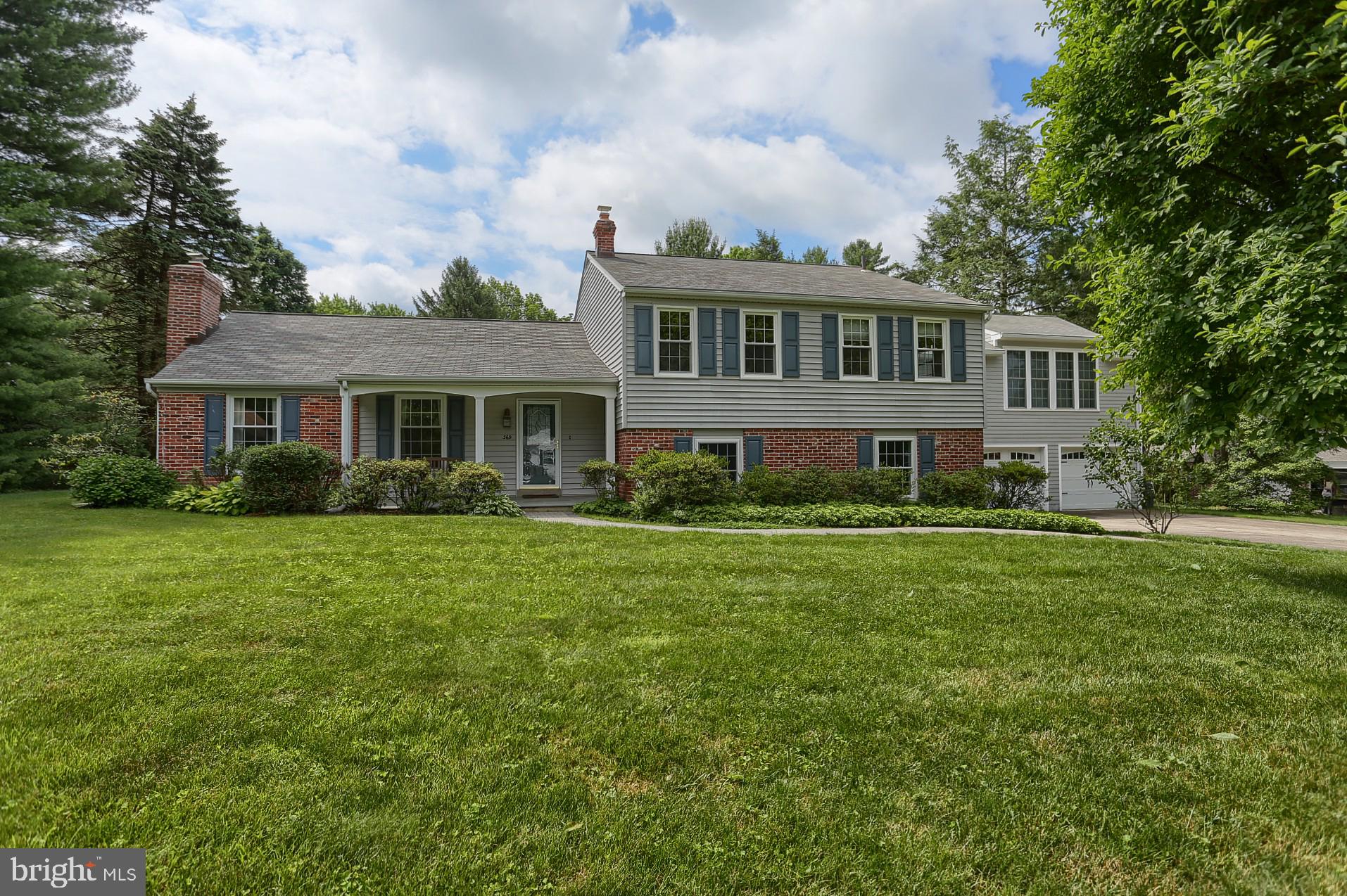 Welcome to 369 Strathmore Drive, sitting on 1.22 acres in the highly sought after Beaupre neighborhood in the award winning Radnor School District.  This home has undergone an extensive remodel; including gourmet kitchen, added bonus room, and new 2 car garage within the past 10 years.   Step through the front door and you are greeted by a mid-century split level home. The main floor features a formal living room with fireplace, formal dining room and remodeled eat in kitchen.  The kitchen features beautiful white cabinets with under-mount lighting,  stainless appliances including double oven, french door refrigerator, and gas range.  On the lower level, you will find a large family room with sliding doors to one of your two outdoor patios  The family room is also connected to the mud room, exercise room, and two car garage.  A powder room, laundry room, and extensive finished storage space with custom shelving finish out the lower level of this home.  The upper level features a large master bedroom with walk in closet, master bath, and provides one of two access points to the bonus room.  Three large bedrooms and hall bath complete this floor.  The rear yard features two patios, expansive flat yard, and manicured mature trees.  This home is just minutes to Bryn Mawr, Villanova, and Main Line shops, restaurants, nearby parks, Septa R5 train line and Norristown High-Speed Line. Easy access to the Blue Route (476) and other major highways, Center City Philadelphia and just 30 minutes to the Philadelphia International Airport.