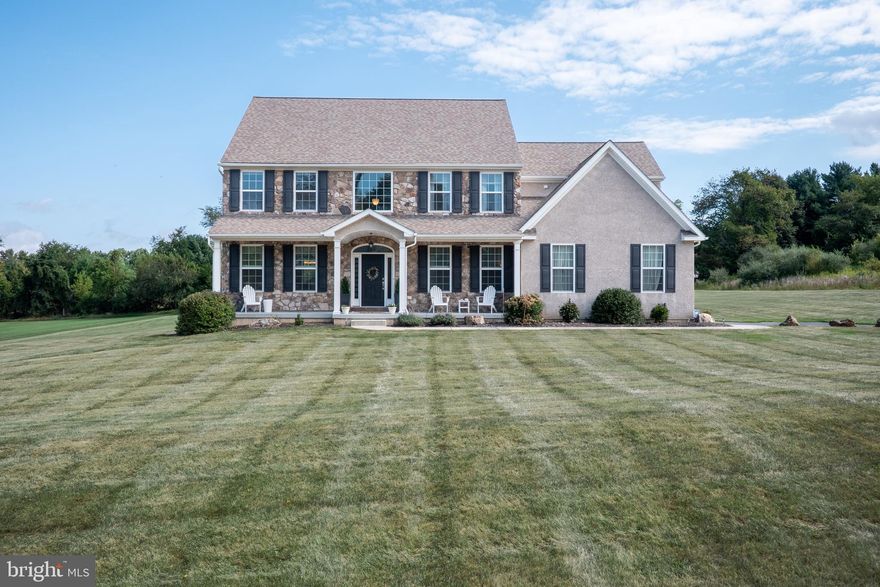 Set on a SERENE 2.18-ACRE PROPERTY in bucolic WILLIAMS TWP, this 4-BEDROOM, 4-BATH HOME offers comfort, versatility, and a strong connection to the OUTDOORS. A TWO-STORY FOYER welcomes you, while VAULTED CEILINGS create an open, airy atmosphere. The FIRST LEVEL includes a BEDROOM or OFFICE with a FULL BATH, ideal for guests or working from home. The KITCHEN anchors the main level with GRANITE COUNTERTOPS, SUBWAY TILE BACKSPLASH, 42” CUSTOM CABINETS, LARGE CENTER ISLAND, PREMIUM STAINLESS-STEEL APPLIANCES, and seamless flow to the dining and living areas. Gather in the FAMILY ROOM around the WOOD BURNING FIREPLACE, with easy access to the MUDROOM/LAUNDRY and attached 2-CAR GARAGE. Upstairs, wall-to-wall carpeting brings comfort to all bedrooms, including the SPACIOUS PRIMARY ENSUITE with ENORMOUS WALK-IN CLOSET and access to the SECOND-LEVEL LAUNDRY ROOM. Three additional bedrooms and hall bath complete the floor. The FINISHED WALKOUT LOWER LEVEL with half bath and recreation space is perfect for a playroom, gym, or media area—while still leaving PLENTY OF UNFINISHED STORAGE. Enjoy the outdoors on the EXTENDED COVERED FRONT PORCH or take in SWEEPING BACKYARD VIEWS from the LOW-MAINTENANCE TREX DECK. The property provides plenty of room for GATHERINGS or QUIET EVENINGS, making it a home that celebrates NATURE AS MUCH AS EVERYDAY LIVING. CONVENIENTLY LOCATED MINUTES FROM RT. 78, DOWNTOWN EASTON & BETHLEHEM, and RESTAURANTS, this home delivers JUST THE RIGHT SPACE—INSIDE AND OUT.