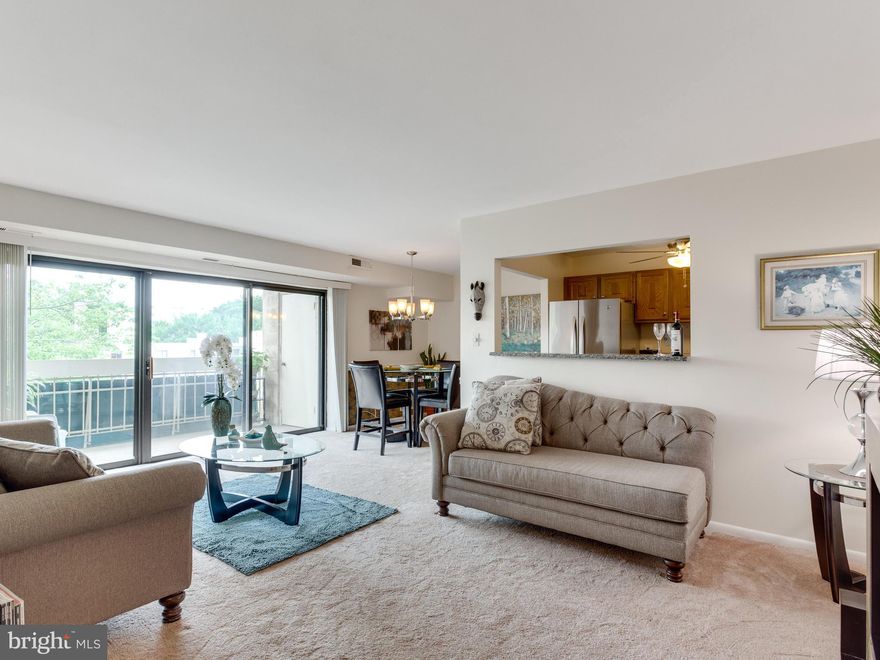 RARE end unit w/ opened up kitchen! Great open concept layout. Tons of updates & features - gorgeous kitchen w/ new granite counters, SS appliances, new fan, pass thru window & laminate fl; dining rm w/ chair railing & new light fixture; spacious BD w/ dual closets; updated BA w/ high end vanity, tile flooring; lg balcony w/ POOL VIEW. Storage unit conveys.  Pool, tennis, & more!