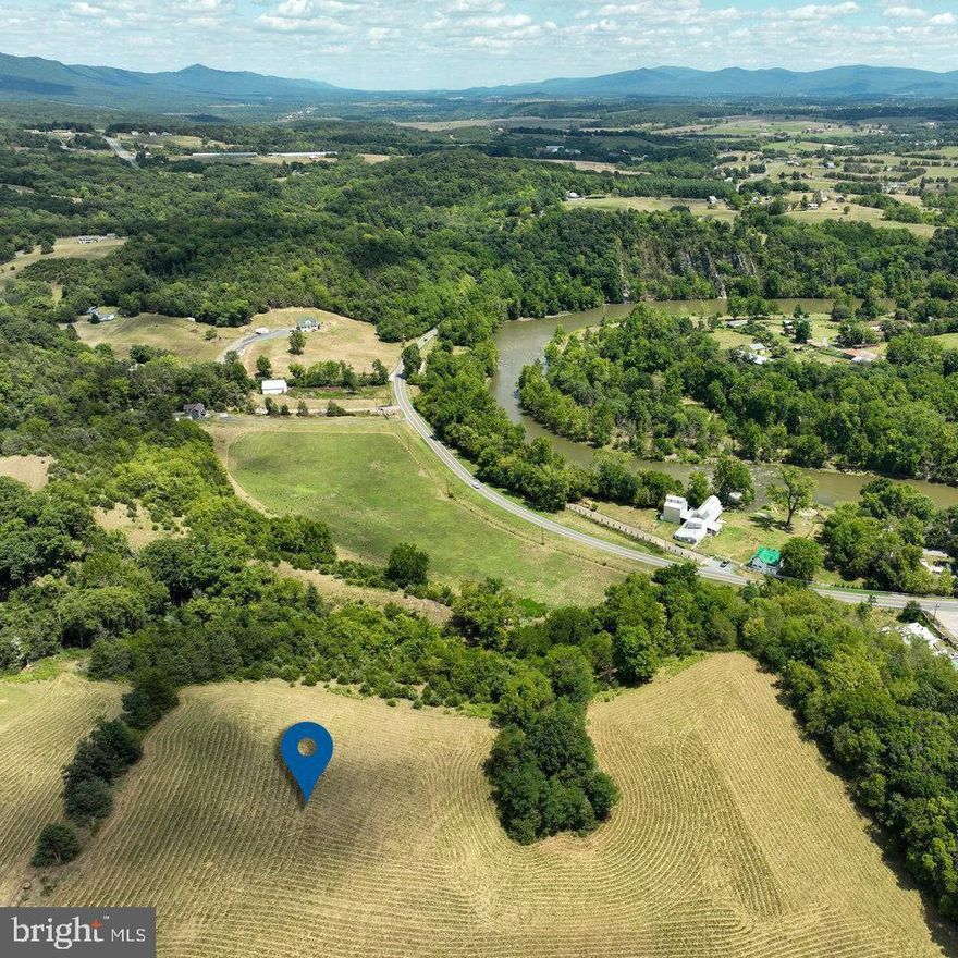 Outstanding 6+ acre farmette at Galloway Springs Farm! This property offers superb privacy and breathtaking panoramic and pictorial views and is located only thirty minutes from Harrisonburg, just over an hour to Charlottesville, and less than two hours from both Washington D.C. and Richmond. There is also easy access to the Shenandoah River, George Washington National Forest, Shenandoah National Park, Luray Caverns, and Massanutten resort. The Property is zoned Agriculture and is currently producing hay. The property qualifies for land use, keeping the annual real estate taxes extremely low. Short-term vacation rentals are allowed and there is NO HOA! Easy access to the South Fork of the Shenandoah River is located near the property at the public boat landing, adding to the endless outdoor recreational possibilities. A  gravel driveway has been installed, a survey has been completed, and a three-bedroom conventional septic letter  is on file.  Do not let the opportunity to own a farmette in the cabin capital of Virginia pass you by.