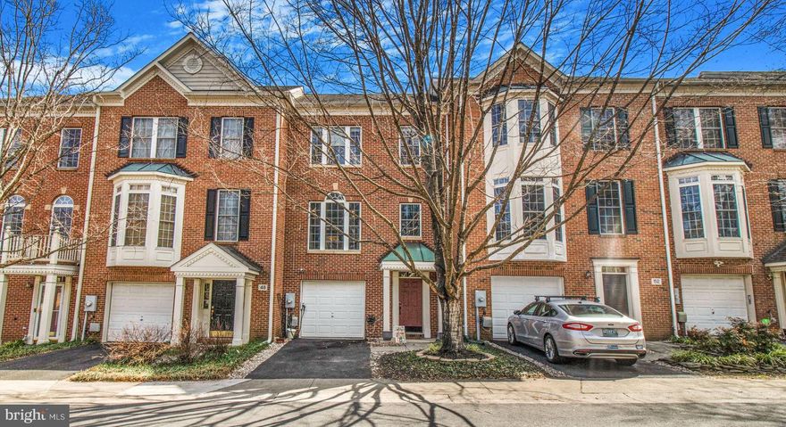 This stunning 3-bedroom, 3.5-bathroom townhouse, boasting over 2,600 sq. ft. of living space, perfectly blends modern elegance with a serene and convenient lifestyle. Nestled in a peaceful community,  this home is ideally situated within walking distance to the Metro (approximately 15 minutes on foot) and just a 10-minute ride with Flex On-Demand Service for added convenience. It is also directly across from Dogwood Park, providing endless opportunities for outdoor activities. It offers a one-car garage and an abundance of natural light that fills every corner, creating a bright and airy ambiance throughout.

Step inside to discover an open floor plan with soaring ceilings on the ground level, making the entire home feel spacious and inviting. The beautifully maintained solid hardwood flooring, which flows seamlessly from the staircases to the main floor and upper hallway, adds both warmth and sophistication. The gourmet kitchen is truly a chef's dream, featuring high-end cabinetry, sleek granite countertops, and a designer center island with a cooktop. It’s the ideal space for both cooking and entertaining, offering generous storage and shelving for all your culinary needs. Adjacent to the kitchen is a sun-drenched breakfast room, where a wall of windows and a French door lead out to the back deck—perfect for enjoying your morning coffee while taking in the scenic views.

The master bedroom is a peaceful retreat, offering a cathedral ceiling, a spacious walk-in closet, and a convenient bonus washer/dryer unit for added ease. The master bathroom has been thoughtfully upgraded with a separate shower, a double vanity, and a luxurious soaking tub—where you can indulge in a spa-like experience while enjoying picturesque views through a large window.

The walk-out lower level is nothing short of exceptional, with 12-feet ceilings, large windows, and a French door that opens directly to a beautifully landscaped backyard with a stunning view of Dogwood Park. This tranquil outdoor space is perfect for relaxation or entertaining. The current owners have transformed this level into a spectacular recreation room, complete with a full bath and can be used as an additional bedroom if needed. An EV charger is conveniently installed at the garage door, ready for current or future electric vehicle owners.

Every inch of this move-in-ready home has been meticulously cared for, ensuring a truly turn-key experience. With easy access to the Metro, Rockville Town Center, I-270, and a wealth of nearby amenities. Additionally, the property is located within a top-rated high school cluster offering an International Baccalaureate (IB) Program and a Chinese immersion program, making it an excellent choice for families. 

This remarkable property offers both convenience and tranquility in an unbeatable location. Don’t miss out on this rare find!