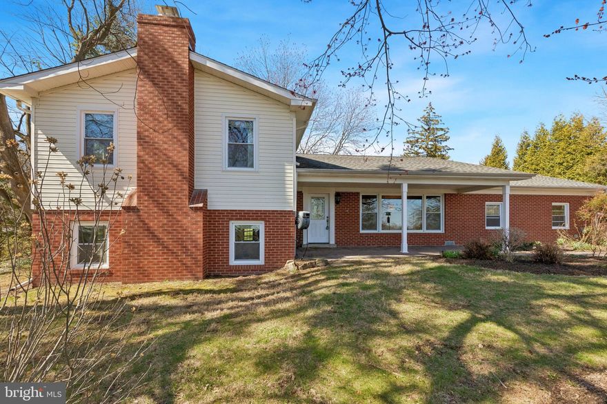 Welcome to 835 N Trooper Road in Lower Providence Township and the highly regarded Methacton School District.  You'll find a beautifully maintained 4-bedroom, 2.5-bath single-family home set on a picturesque 1.32-acre lot with breathtaking views stretching all the way to the Philadelphia skyline. This property features a stunning in-ground POOL that was  renovated just two years ago with new gunite, coping, tile, and surrounding concrete, as well as a DETACHED 2 CAR GARAGE with a finished office above equipped with a mini-split system for heating and cooling—perfect for working from home.   As you enter the home you'll find the main level includes a spacious living room and an updated kitchen with stainless steel appliances, upgraded cabinetry with glass doors, and a dining area with an oversized sliding glass door leading to a relaxing flagstone patio, ideal for indoor-outdoor entertaining. Hardwood floors run throughout the main and upper levels. Upstairs, the primary suite offers two closets and an updated en-suite bath with a stall shower, double bowl granite vanity, and upgraded tile, along with two additional generously sized bedrooms with large closets and a renovated hall bath. The lower level features a cozy family room with slate tile flooring and a beautiful stone fireplace, a fourth bedroom or private office with closet, a powder room, and a laundry area. Additional highlights include a newer GAF roof, making this home a perfect blend of comfort, updates, and exceptional outdoor living in a prime location.  You'll enjoy the rare combination of space, privacy, and lifestyle this property offers also the convenience with route 422 just minutes away making for easy commuting, Providence Town Center is just a short drive with Wegmans, the Movie Tavern and so much shopping and great restaurants.  This home is a must see!