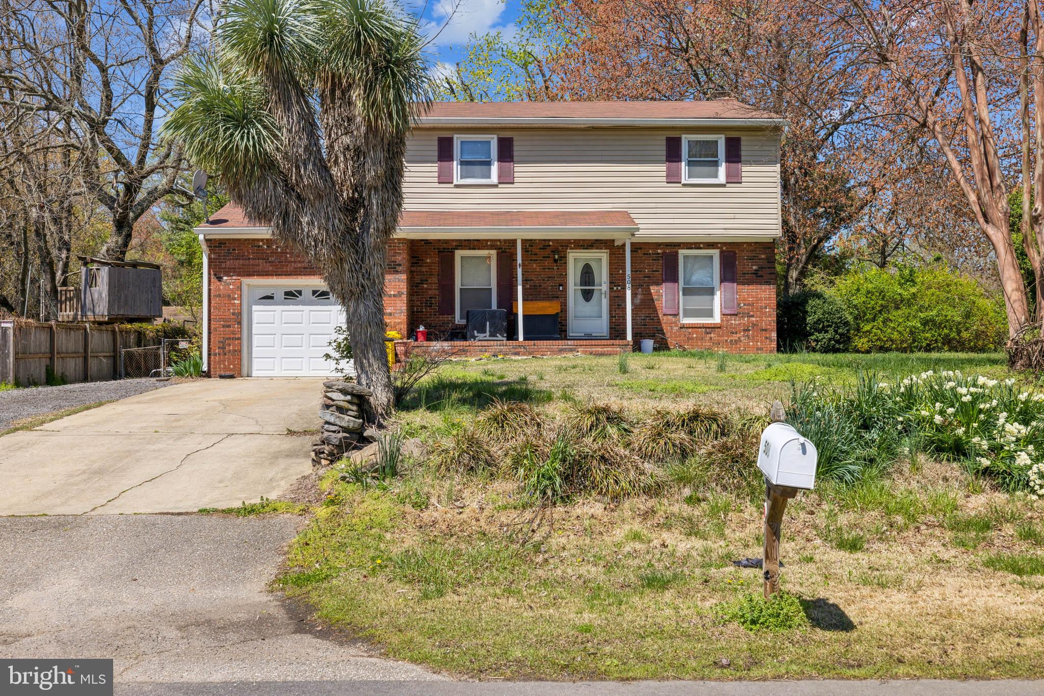 Charming colonial in water-privileged Hillsmere Estates! This well-maintained 4BR/1.5BA home has great bones and plenty of potential. Enjoy an updated kitchen with a cozy fireplace, hardwood floors, and a main-level bonus room that could be converted to a 5th bedroom. The existing half bath on the main level could become a full, and the spacious primary suite offers room to add a second bath. Two upper bedrooms have newer mini-split systems, in addition to the main HVAC. Outside, you’ll find a fenced yard and oversized garage. The walk-up unfinished basement adds even more space to expand. All this plus community water access, beach, and pier on the South River!