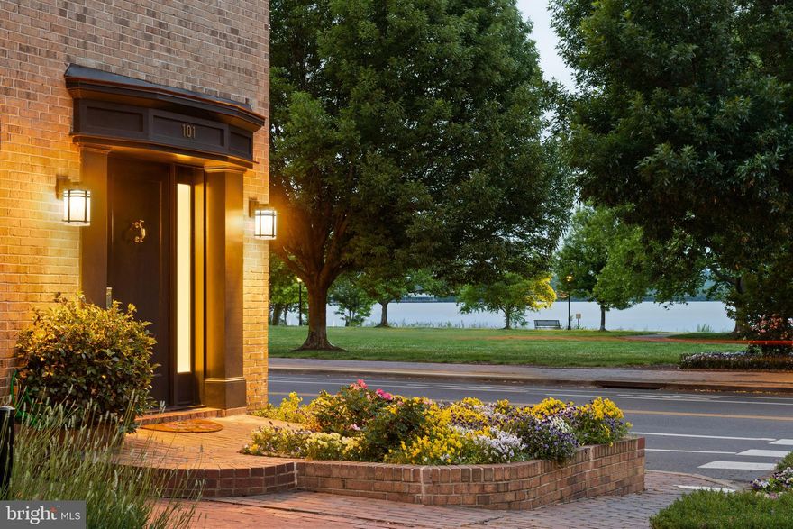 Enjoy the ultimate river view location with garden, stone patio and parking for 2 cars.  Welcome to 101 Quay Street, overlooking the Potomac River and 3 blocks to King Steet. This quaint one block street is a highly sought after location in Old Town and not a cut through road.  Delight in the Old Town lifestyle with exceptional restaurants, waterfront activities and shopping.  Live your life on vacation everyday.  If you are a boater, bring your boat to the city dock or take the water taxi to DC and Nats Park.                                                            
Owners have meticulously updated this home with a masterful renovation in 2015/16 and spared no expense.  The renovation included expanding windows to enjoy unobstructed views of  the Potomac River.  Renovating over 3000 sq ft with 3/4 bedrooms/office, 2 full and 2 half baths,  commercial kitchen with 
 gas Wolfe cooktop and oven and Subzero appliances and custom inset Omega Cabinetry,  private patio with water views and fountain, garage and driveway parking.  Plus no HOA!                                                                                                                                                                                      Other special features include heated porcelain floors in the lower level with walls of closets on each side and powder room.
The main level offers 11 ft ceilings in the living room with gas fireplace, custom built-ins and french doors to patio.
The kitchen has island seating with panoramic water views while enjoying your morning coffee.                                                                       The primary bedroom suite fits a California king bed and offers both a walk in closet and wall of closets plus a large bath with dual sinks and walk in shower with bench.  Also on this floor are 2 additional bedrooms and a full bath.                                                                                                               
The inspiring top level is perfect for home offices, separate living area, exercise or art studio with half bath, laundry and plenty of storage.
National Airport is a mere 8 - minute drive and 15 minutes to the US Capitol. 
Plus, live the life of Hollywood in this legendary home where Kevin Costner and Gene Hackman filmed their hit movie "No Way Out".   Reimagine each scene as it was shot in your own living room.
Looking for easy convenient living  and location, this is it!