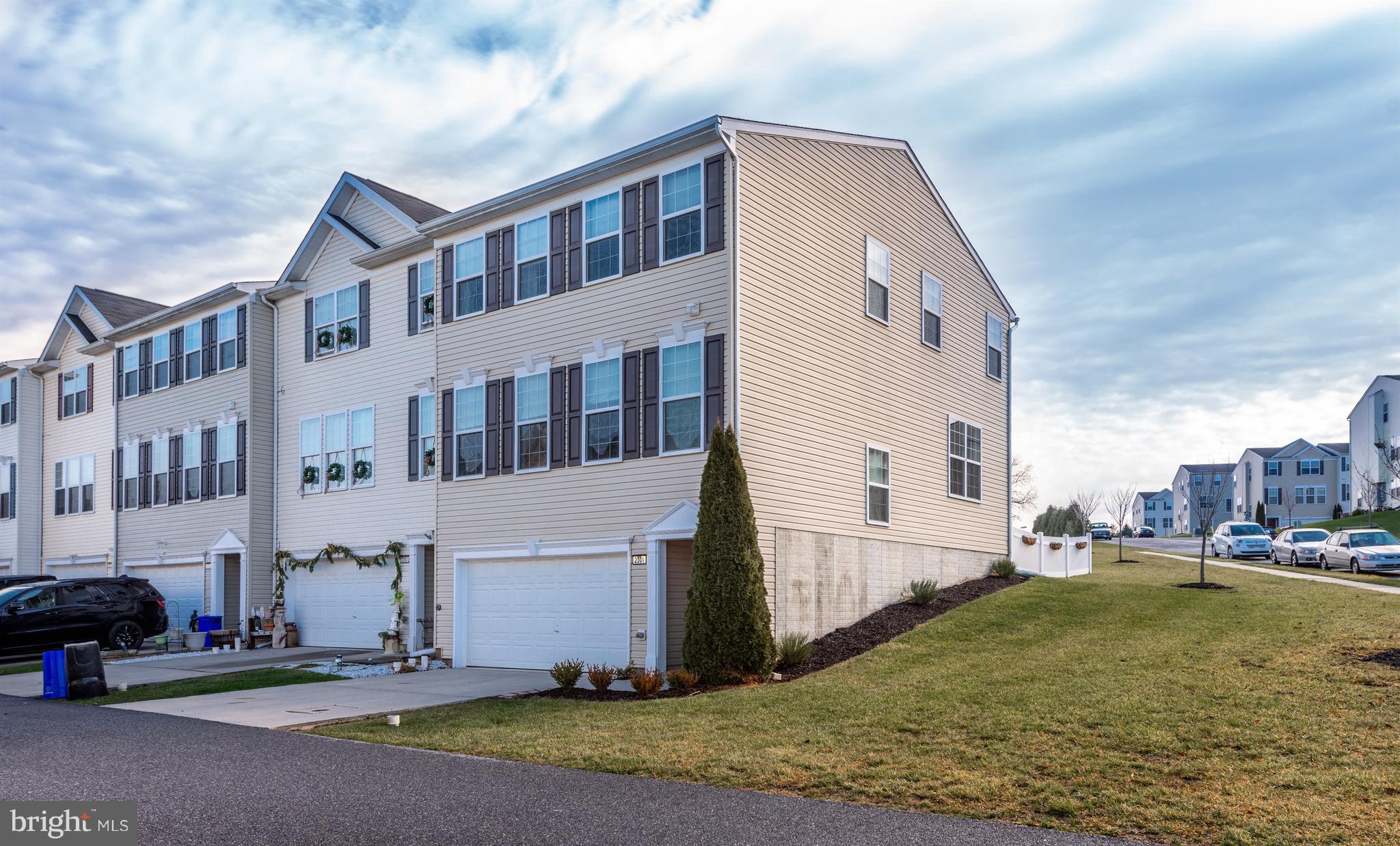 Check out this beautifully maintained 3BR/2.5BA townhome in the Iron Bridge Landing community. This move-in ready end unit townhome has an attached 2 car garage & has been updated/freshened up throughout. On the lower level you'll find a finished basement Family Room where you can relax & watch a movie with the surround sound speaker system. Upstairs on the main level are separate living/dining rooms & a warm & inviting Kitchen w/ full island and pantry. On the top level you'll find a Master Bedroom w/ vaulted ceiling & walk-in closet and an attached Master Bath with double sinks, soaker tub, & a stall shower. An additional two bedrooms, full bath, & convenient laundry room are also on the top level. Outside is a fenced backyard that adjoins to a large open yard space. Updates include newer A/C unit, new dishwasher, new carpet, & fresh paint in the KIT/DR/Mast BR/foyer/FamRm. All appliances & a 1 year HMS home warranty come with the home purchase. What more could you need? Schedule your showing today!