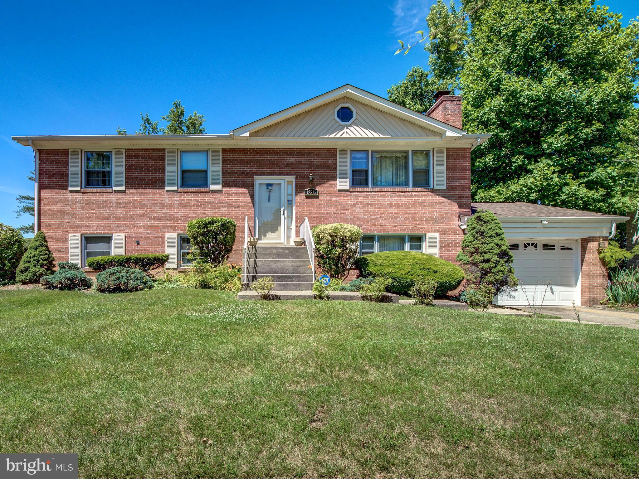 Back on the Market - Buyer's Financing fell through. Welcome to this stunning all brick single family home. This expansive split-level home offers a perfect blend of comfort and convenience, with no HOA. Featuring three polished bedrooms and two full bathrooms on the main level, and two additional bedrooms with a full bath in the basement, this home accommodates both privacy and community. The backyard of the home is an entertainer's delight! Home is in a developed neighborhood with mature landscaping. The large level yard, patio and deck make entertaining a snap! Enjoy the best of outdoor living with a screened-in and covered porch, perfect for savoring those warm summer evenings or hosting gatherings. Sold as-is, this home invites you to embrace its potential and make it your own. This property is truly a gem!