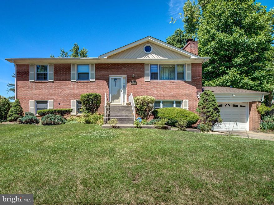 Back on the Market - Buyer's Financing fell through.  Welcome to this stunning all brick single family home.  This expansive split-level home offers a perfect blend of comfort and convenience, with no HOA.  Featuring three polished bedrooms and two full bathrooms on the main level, and two additional bedrooms with a full bath in the basement, this home accommodates both privacy and community. The backyard of the home is an entertainer's delight! Home is in a developed neighborhood with mature landscaping. The large level yard, patio and deck make entertaining a snap!  Enjoy the best of outdoor living with a screened-in and covered porch, perfect for savoring those warm summer evenings or hosting gatherings. Sold as-is, this home invites you to embrace its potential and make it your own. This property is truly a gem!