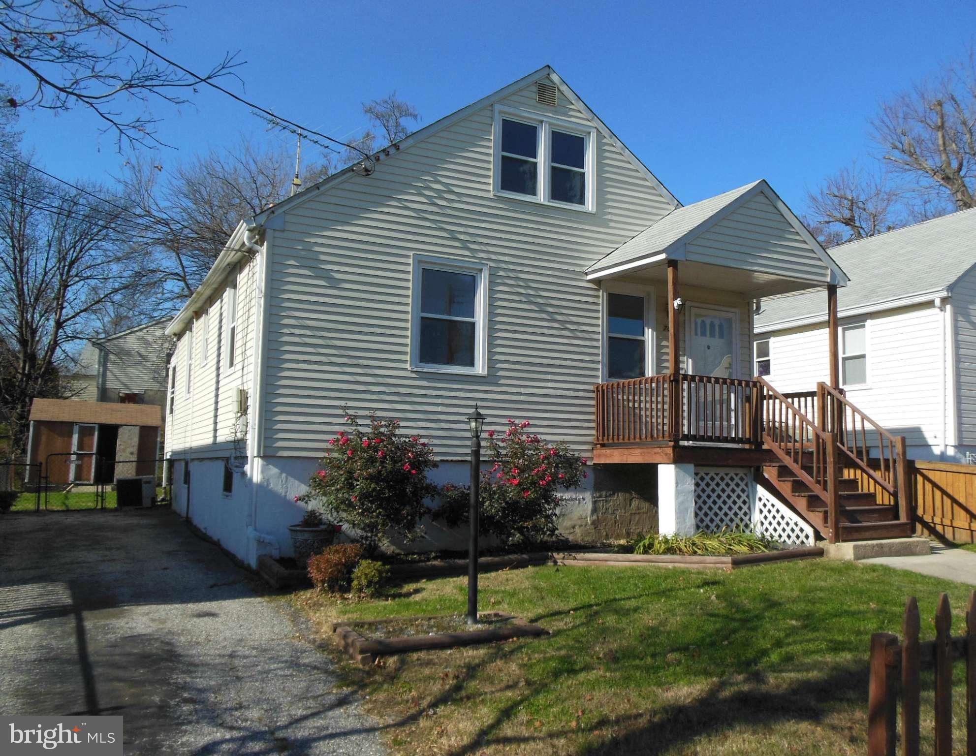 AFFORDABLE PARKVILLE HOME HAS FOUR BEDROOMS, EAT-IN KITCHEN, BIG REAR ENCLOSED SUNROOM, TOO. FIRST FLOOR BOASTS WOOD FLOORS JUST WAITING TO BE REFINISHED OR CARPETED. LOWER LEVEL HAS LARGE L-SHAPED FAMILY ROOM, SEPARATE LAUNDRY ROOM, UTILITY ROOM, REAR ENTRANCE. CONVENIENT DRIVEWAY PARKING, SHED IN REAR. PROPERTY SOLD AS-IS.