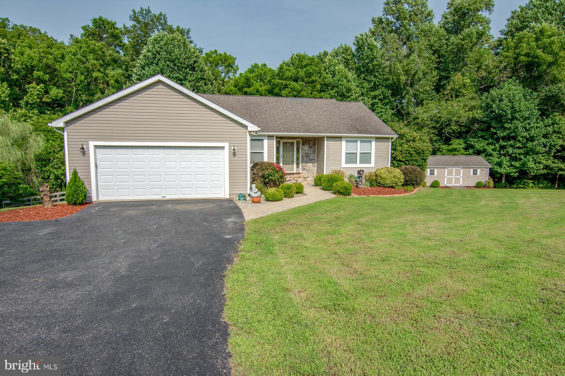 TRANQUILITY AT ITS BEST, THIS FABULOUS HOME BOASTS A GORGEOUS 3 ACRE LOT AND HAS BEEN METICULOUSLY MAINTAINED.NEW APPLIANCES,NEW LOWER LEVEL CARPET,NEW AC COMPRESSOR,NEWER FENCE AND FRESHLY STAINED DECK.DETACHED OVERSIZED SHED/WORKSHOP W/ NEW ROOF.LOWER LEVEL IN-LAW SUITE/APT W/ FULL WET BAR FOR ENTERTAINING.SPACIOUS 2 CAR GARAGE W/LARGE DRIVEWAY.CONVENIENT LOCATION,MAKE THIS HOME YOURS TODAY!!