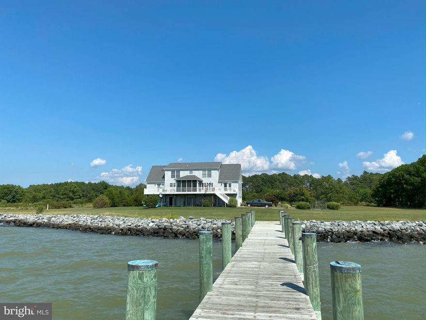 Stunning Waterfront Retreat on the Chesapeake Bay!
Experience the ultimate in waterfront living with this breathtaking home featuring 500 feet of protected shoreline on over 8 acres of serene countryside. Just 14 miles from historic downtown Cambridge, this property offers unparalleled privacy and an abundance of nature and wildlife.
Enjoy panoramic water views from every room in this 3-level home. The main level boasts a spacious kitchen with maple cabinets, a center island, and stainless steel appliances, along with a large dining area, living room, owner's suite, and a versatile dining room/office.
Upstairs, you'll find four additional bedrooms and two full baths. Entertain with ease in the 25x26 recreation room, complete with a summer kitchen and full bath, or relax on the large waterside deck, screened-in porch, and covered patio below.
The property includes a 100ft pier with a 10,000lb boat lift, perfect for boating enthusiasts. An oversized 2-car garage, dual-zone Trane HVAC units, and an additional exterior electrical panel ensure convenience and comfort. This quality-constructed home is a nature lover's paradise and a rare find!
If you're not familiar with Cambridge you might want to learn more about the new waterfront development project with plans for a promenade, hotel, restaurants and more!