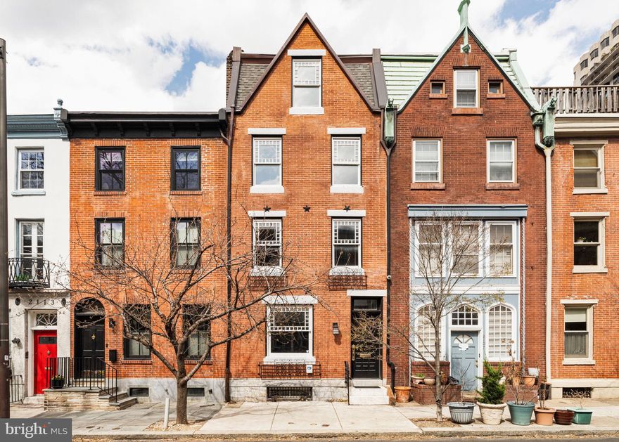 Four-story townhouse with elevator in a prime Rittenhouse Square location. This recently renovated property offers 2600+ SF of elevated living plus a basement with ample storage. Enter into a lovely foyer with a built-in bench and continue into the open kitchen/dining/sitting room with a dramatic double-height opening. The striking kitchen is outfitted with Wolf & Sub-Zero appliances, an oversized island with quartz countertops, and custom cabinetry. The 1st level is complete with a powder room and mudroom with custom built-ins. 

The 2nd level of this home features a south-facing facing living room  with a gas fireplace and custom-built-ins, including a wet bar with wine refrigeration and storage. A conveniently located powder room is just down the hall, and there is a laundry room with a full-sized washer, dryer, and utility sink. 

The 3rd level of this home is the Primary Suite, with a spacious bedroom, en-suite marble bathroom with double vanity sink, freestanding bathtub and glass-enclosed shower, plus a generously outfitted dressing room/walk-in wardrobe. Two additional bedrooms and a hall bathroom with a double vanity sink & bathtub/shower combo are located on the 4th level. The roof deck is accessed through the main staircase, offering exceptional views and a quiet place for a morning coffee or evening cocktail. 

It is located in the heart of the neighborhood, with easy access to the best restaurants, retail, and city conveniences. A short commute to Comcast/Xfinity, 30th Street Station, Penn & CHOP, and located in the Greenfield Elementary School Catchment. This property is tenant-occupied through 5/31/25. 3.5 years remain on the tax abatement.