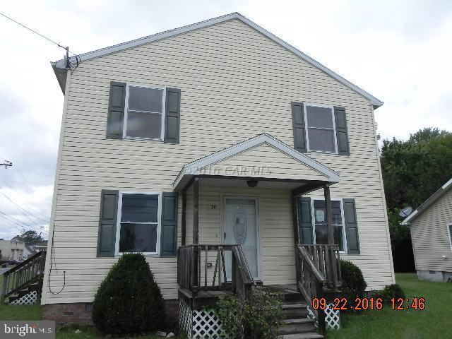 Check out this two story in good condition within walking distance to Town amenities. Vinyl siding, insulated windows, separate dining room and a half bath on first floor. Corner location with driveway. Being sold ''as is'' which is terminology for a foreclosure.
