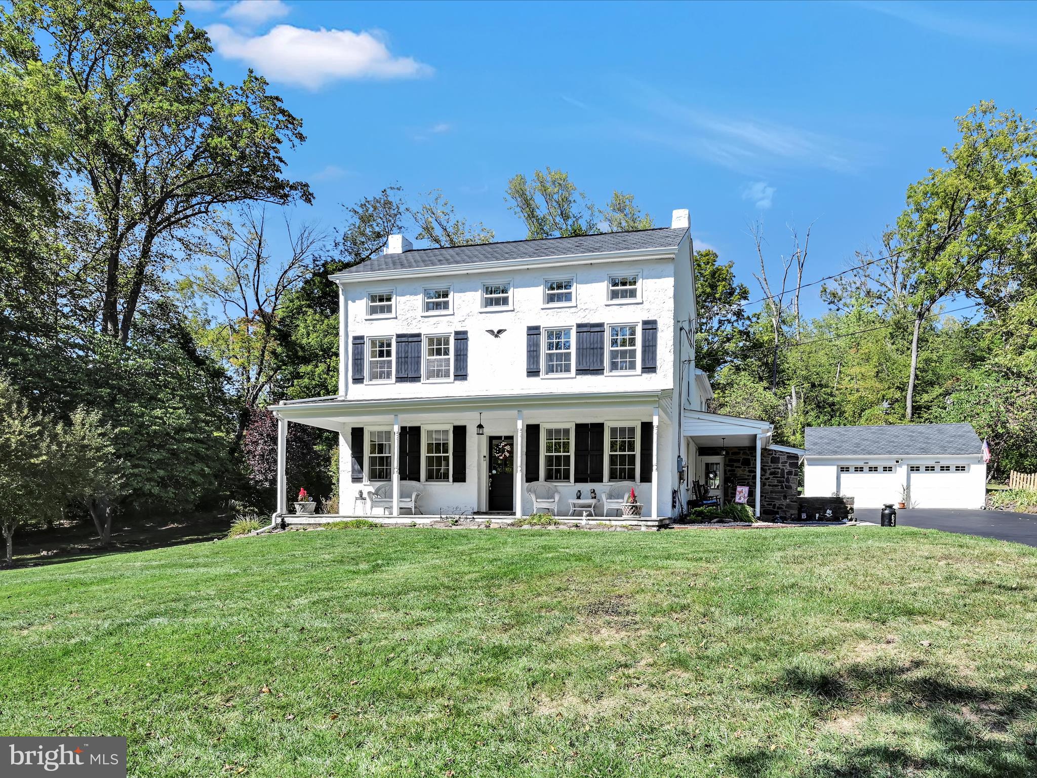 🏡 Welcome to 63 Smith Road – A Special Farmhouse Full of Heart and History! Step into a storybook home built in 1850, where old-time charm meets modern comfort. This beautiful farmhouse sits in the sought-after Methacton School District, and has been lovingly updated with over $260,000 in improvements. It’s peaceful, private, and full of surprises that make every day feel special. 📜 A Home with History— Imagine living in a house that’s been standing for over 170 years! This farmhouse has strong bones and a warm heart. You’ll feel the history in every deep windowsill and cozy corner. Peace and Quiet All Around—The Sunroom is a perfect place to relax. Look out the windows and enjoy views of nature. Step outside to the Stone Patio, where you’ll find a Fire Pit—great for roasting marshmallows or telling stories under the stars. 🍽️ A Kitchen Made for Cooking and Smiles—The kitchen was remodeled by Jeff Devlin from HGTV’s Stone House Revival. It has a vaulted ceiling, exposed stone wall, and custom cabinets with handmade rat tail hinges. There’s a soapstone countertop, a butcher block island, and even a heated stone floor to keep your toes warm in winter. You’ll also find top-notch appliances like a GE stove, Bosch dishwasher and a custom hood built by Jeff himself as well as a hidden dishwasher and two large well appointed appliance garages. 🪵 Hardwood Floors That Shine—The floors have been refinished and updated in many rooms, including the Living Room, Dining Room, Great Room, Bedrooms, and Hallways. They’re smooth, strong, and full of character. 🛋️ A Cozy Great Room—This room is perfect for movie nights or quiet reading. It has recessed lights, window tinting, and a warm, welcoming feel with the built-ins and Fireplace. 🪟 Deep Windowsills That Tell a Story—These wide windowsills are perfect for plants, books, or just sitting and watching the world go by. ⚙️ Old World Charm meets Modern Convenience—Upgrades like mini-split heating and cooling systems, a new heater, oil tank, and whole-house water filtration. You’ll enjoy the charm of the past with the comfort of today. 🚗 A Big Garage with Room to Spare—The oversized garage is great for cars, tools, or even a workshop. 🌊 A Gentle Creek at the Edge of the Property—At the bottom of the yard, you’ll find Skippack Creek. It’s a lovely spot to explore or just sit and listen to the water. 📍 Private but Close to Everything—Even though it feels like a quiet escape, this home is close to Collegeville, King of Prussia, and major highways. You get the best of both worlds—peace and convenience. More Upgrades That Make Life Easy and Fun: Sunroom: New windows, slate tile floor, insulation, ceiling, and heater. Bathrooms: Updated with quartz sink tops, new tile, shower glass, and modern fixtures. Water System: New deep well pump, water softener, whole-house filter, and Well Manager system. Exterior: New Roof, gutters, shutters, paint, porch repairs, custom Amish Bilco doors, and beautiful bluestone patio and walkways. Interior: Fresh paint in many rooms, attic insulation, and closet organizers. HVAC: New mini-splits in several rooms, heater, and oil tank. Electrical: Partial house generator for the vital systems and surge protector. Basement: Waterproofed with a French drain. This home is more than just a place to live—it’s a place to love. With its rich history, peaceful setting, and thoughtful updates, it’s ready for someone new to make happy memories here. 💖