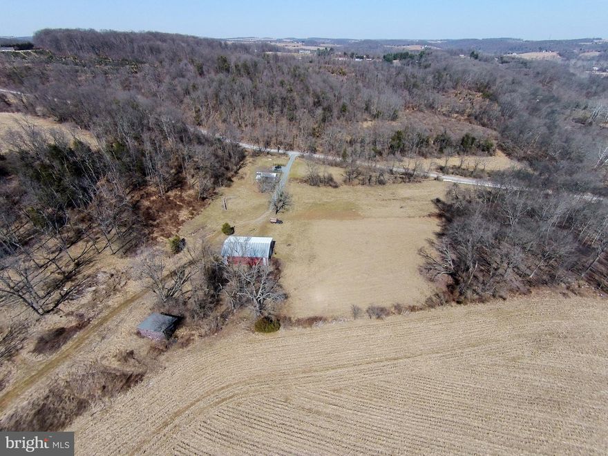 Wow, private 167.25 acres located in Fawn Township. This property includes a spring house, a pole building, and a charming cottage, along with breathtaking surroundings. Unparalleled privacy down Gamble Rd with a creek running through the property adding to this park like setting.  With the rare opportunity to own such a vast piece of land, complete with 34 dwelling rights, this has tons of options.  Incredible for hunting too!  Property could also be logged to produce income.  Don't miss your chance to make this extraordinary property yours.