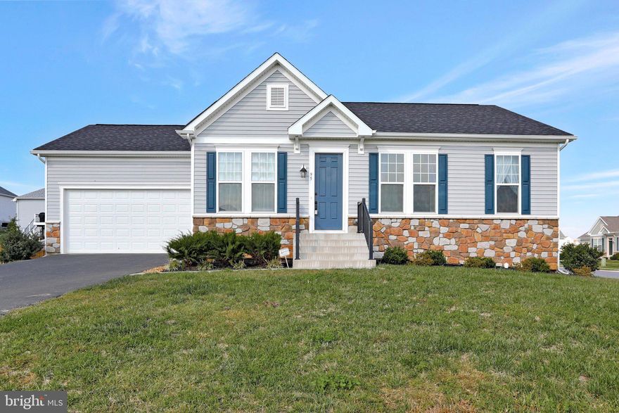 Impressive contemporary rancher with great layout in sought after Norborne Glebe! All the convenience of single floor living, but with a finished basement too.  On the main level, you'll find beautiful dark hardwood floors. The kitchen features granite countertops, large island, and stainless steel appliances (the dishwasher is brand new!). Three bedrooms--including a stunning primary suite--and two full baths complete the main level. The finished basement contains a bedroom and full bathroom along with a family room and has walkup stairs to the backyard. This home is move-in ready and freshly painted! All this on a nice corner lot in a beautifully landscaped neighborhood that has lots of common space and is conveniently located directly off 340. Property  was under contract and buyers' financing fell through, so this is your opportunity to get in!