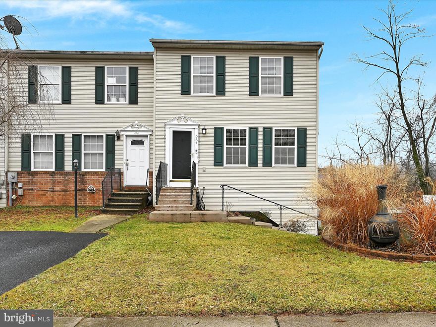 Townhome located in a  serene and private back yard setting.  An upper deck off of the main living level  & a lower deck off of the finished basement family room overlook a stream. This end unit features a side loading garage with plenty of off-street parking and a shed.  2 spacious bedrooms each have 2 closets w/ ample storage space. Light & bright kitchen adjoins dining area which is open to the living room.