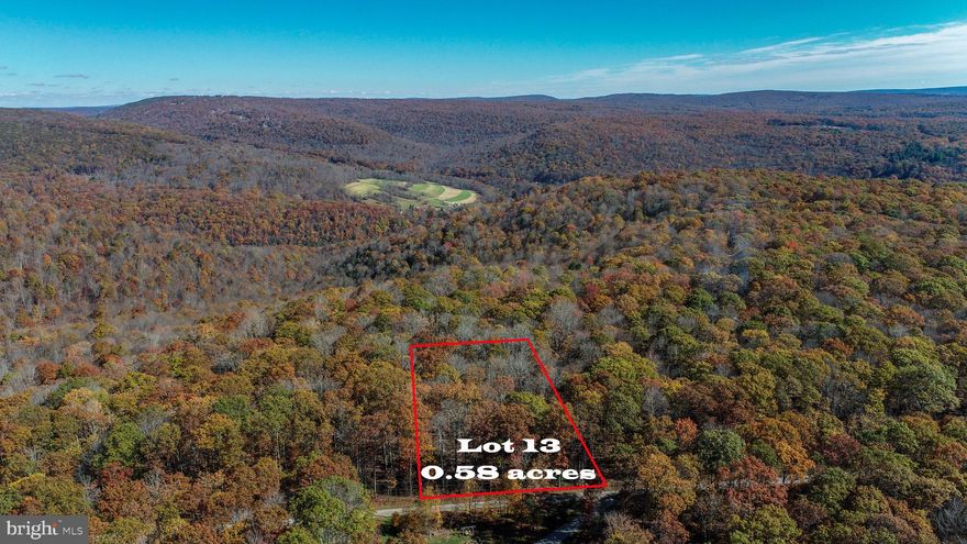 Discover the perfect blend of privacy and potential with these two adjoining lots located in the Youghiogheny Mountain Resort community. Lot 13 Dogwood Drive offers 0.58 wooded acres of mountain serenity. Lot 13 is approved for a sand mound septic system, making it an ideal site for your future mountain cabin or getaway retreat.  The community offers gated access, over 50 miles of community roads and trails for recreational use, river and hiking trail access, and a peaceful mountain setting just a short drive from Deep Creek Lake, state parks, and all the outdoor adventure Garrett County is known for. Whether you’re looking to build, invest, or simply enjoy the mountain lifestyle, these two lots offer a great opportunity to own your piece of Western Maryland’s mountain beauty!