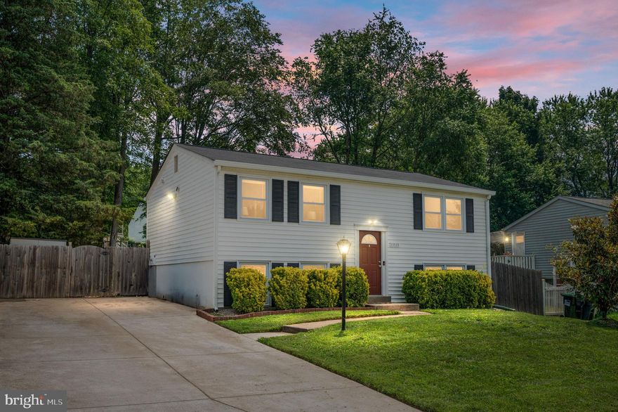 Situated on a cul-de-sac in a quaint and quiet neighborhood, this adorable split-level home features an inviting layout, perfect for everyday living. On the main level, you'll find your primary living space, two bedrooms, and a full bathroom with dark engineered hardwood floors throughout as well as a spacious, modern kitchen with matching ceramic tile. Right off of the kitchen, step out onto a lovely deck overlooking the fully fenced backyard — ideal for relaxing or entertaining. Downstairs, you'll find a large rec room for extra living space as well as another bedroom and full bathroom . This home is conveniently located near shopping, dining, and schools with an easy commute to Fort Belvoir. Come see it for yourself!