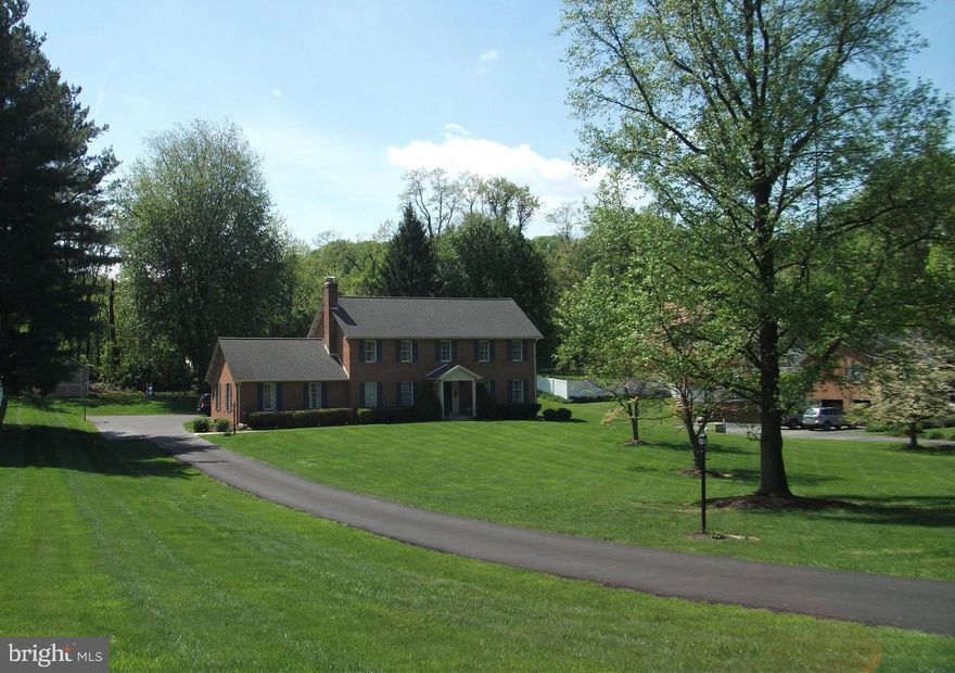 No HOA, no water/sewer bill!  Custom-built home on 1.29 acres built by Ausherman backs to 25 acre farmette.  Hardwood floors throughout the main level.  New HVAC in 2025, 50 Year Roof in 2013, Driveway resurfaced 2022 and seal-coated 2025.  Features 4BR, 2.5BA with 3 Living Areas (Formal Living Room, Fireplace Room, Family Room) with connecting walkout in basement. Plenty of built-in storage and all-electric kitchen. Only 2 owners. Listing Agent is the Seller.