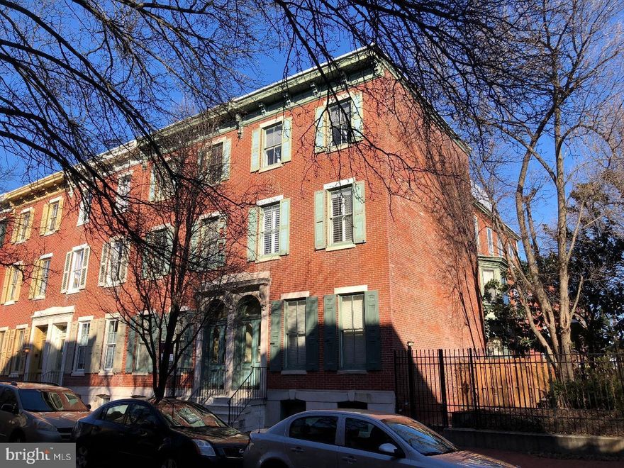 Welcome to Wallace Court Condominiums, where a historic building meets modern living! Step into this recently renovated home boasting hardwood floors, spacious rooms, and a pristine white shaker style kitchen equipped with stainless steel appliances. The expansive living room is highlighted by a wood-burning fireplace, recessed lighting,  and picturesque views, creating a serene ambiance. Bathed in natural light, the south-facing bedroom offers ample closet space, large windows, and a luxurious full bath featuring crisp white marble-like tiles, a new soaking tub, and granite counters. As if that weren't enough, this unit also includes a Bosch washer and dryer for added convenience, new  state of the art HVAC system, along with an assigned parking space in the private gated lot adjacent to the building. Welcome home to this effortless luxury living at Wallace Court Condominiums!