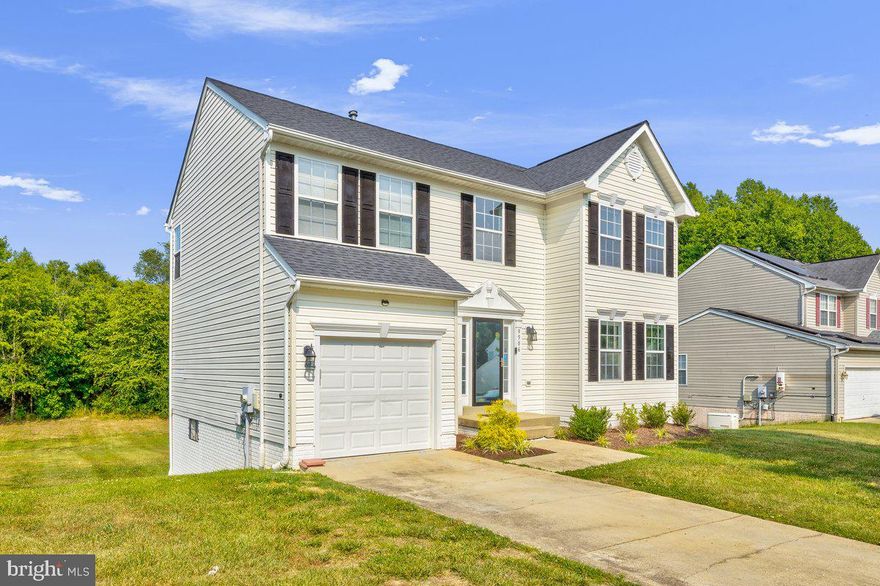 Welcome to this stunningly updated home that offers 4 bedrooms, 3.5 baths, and an additional bonus room on the main level. Step inside and be greeted by beautiful hardwood floors that flow throughout the main living areas. The gourmet kitchen has been completely renovated, boasting new cabinets and appliances that will delight any aspiring chef.

You'll also find new carpet throughout the home, creating a cozy and inviting atmosphere. The finished walkout basement provides additional living space for relaxation or entertainment. Every room has been thoughtfully painted, giving the home a fresh and modern feel.

The bathrooms have been beautifully updated, providing a spa-like experience. With attention to detail and quality craftsmanship, no expense has been spared in making this home truly exceptional.

Situated on a private lot, this home offers a peaceful retreat with a backyard that backs to lush greenery. Enjoy outdoor activities and create lasting memories with family and friends in this serene setting.

To top it off, the roof is only 1 year old, ensuring added peace of mind and long-term durability.

This home is truly a gem that combines style, comfort, and functionality. Don't miss out on the opportunity to make it yours. Schedule a showing today and experience the true beauty of this meticulously updated home.