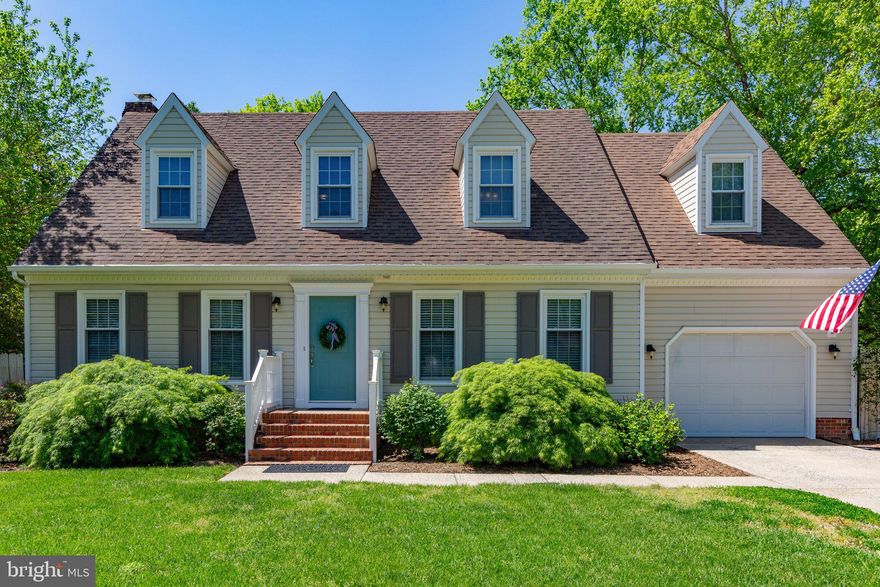 You will love this perfect Cape Cod Charmer located in popular Woodlawn*Amazing 1/2 acre well landscaped  setting *Situated in a NON-HOA neighborhood without restrictive regulations and just minutes to downtown Fredericksburg*Over 2000 square feet finished and upgrades throughout*Gleaming wood floors throughout most of main level lending warmth and elegance to the space*Separate living room offers flexibility doubling as a potential main level office*Formal dining room for holiday dinners*The renovated eat in kitchen is a chef's delight, featuring crisp white cabinets, granite counters and stainless steel appliances*Built in bookcases and the wood burning fireplace enhance the  cozy ambiance of the family room which seamlessly connects to the back yard*Upstairs there are 3 large bedrooms and 2 full baths. The 13 x 17 primary bedroom suite is spacious and has 2 walk in closets* Relax in the tiled walk in shower in the  newly renovated primary bathroom* Enjoy the  two-level low maintenance deck and firepit perfect for entertaining*Don't miss the oversized garage or the fully fenced in rear yard*