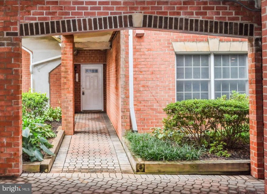 Falls Station is conveniently located on the border of Arlington and Falls Church City, near shops, dining and public transportation.  Sunny freshly painted end/corner unit is just steps from its reserved parking space--no stairs!  Enjoy covered walkway to your front door.  Features include new HVAC, new carpet in the bedrooms, gas fireplace and gas cooking, porcelain and ceramic tile floors, patio opens to common lawn area.  Stack washer/dryer and dishwasher less than five years old.  Very nicely maintained property, comfortable community, super convenient location and a wonderful condominium unit ready to be your new home!   Whirlpool tub as is.